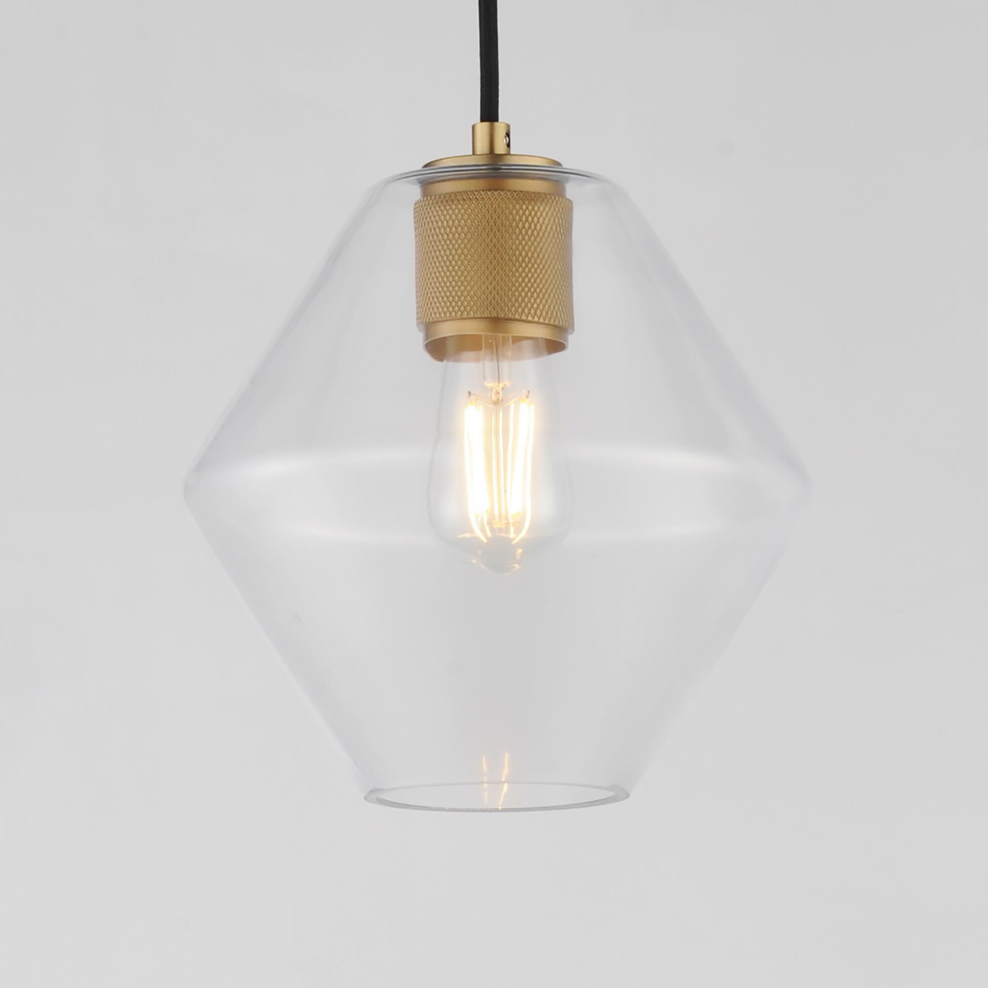 Shown in Natural Aged Brass finish and Clear glass