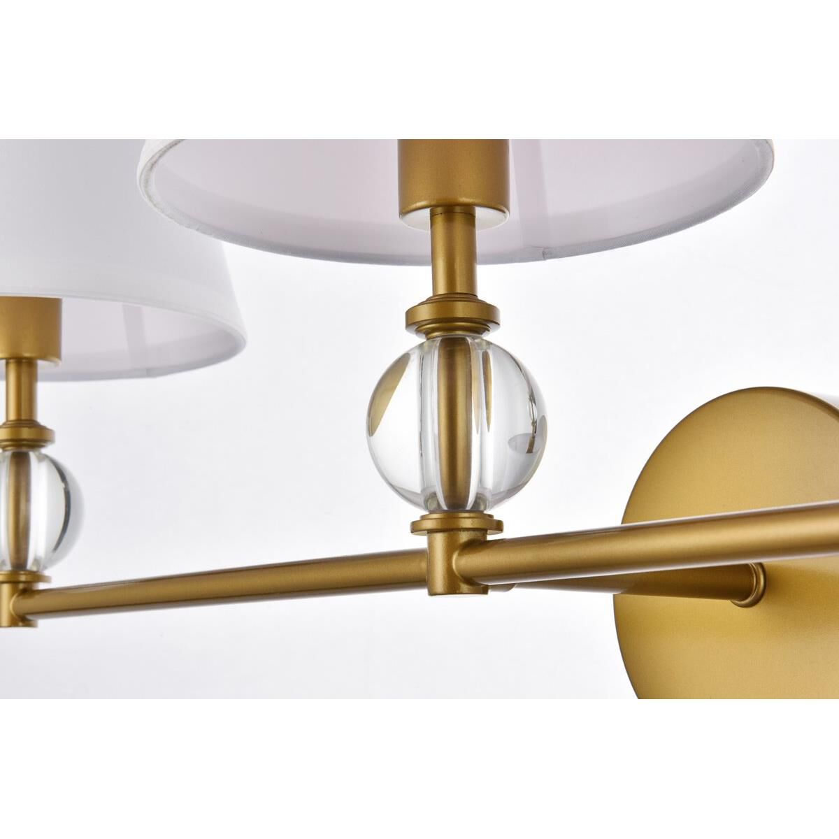 Shown in Brass finish and Royal Cut Clear crystal and White Fabric shade