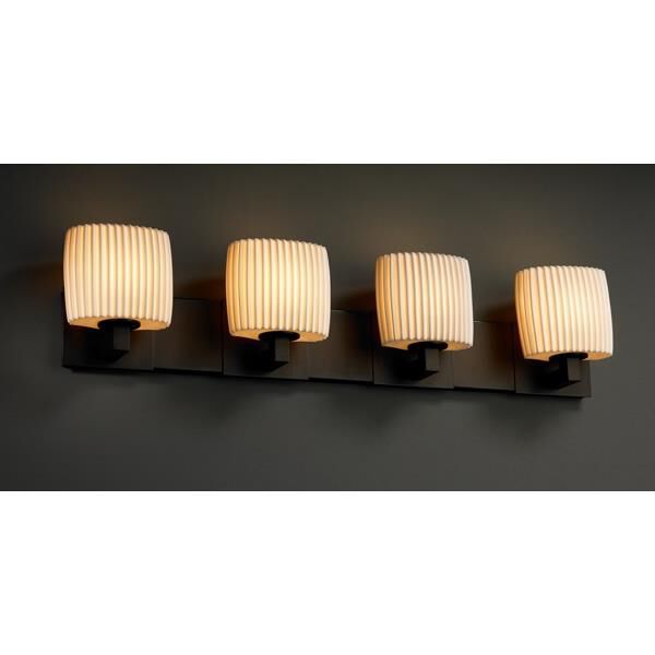 Shown in Dark Bronze finish and Translucent Porcelain glass and Pleats shade and Oval accent