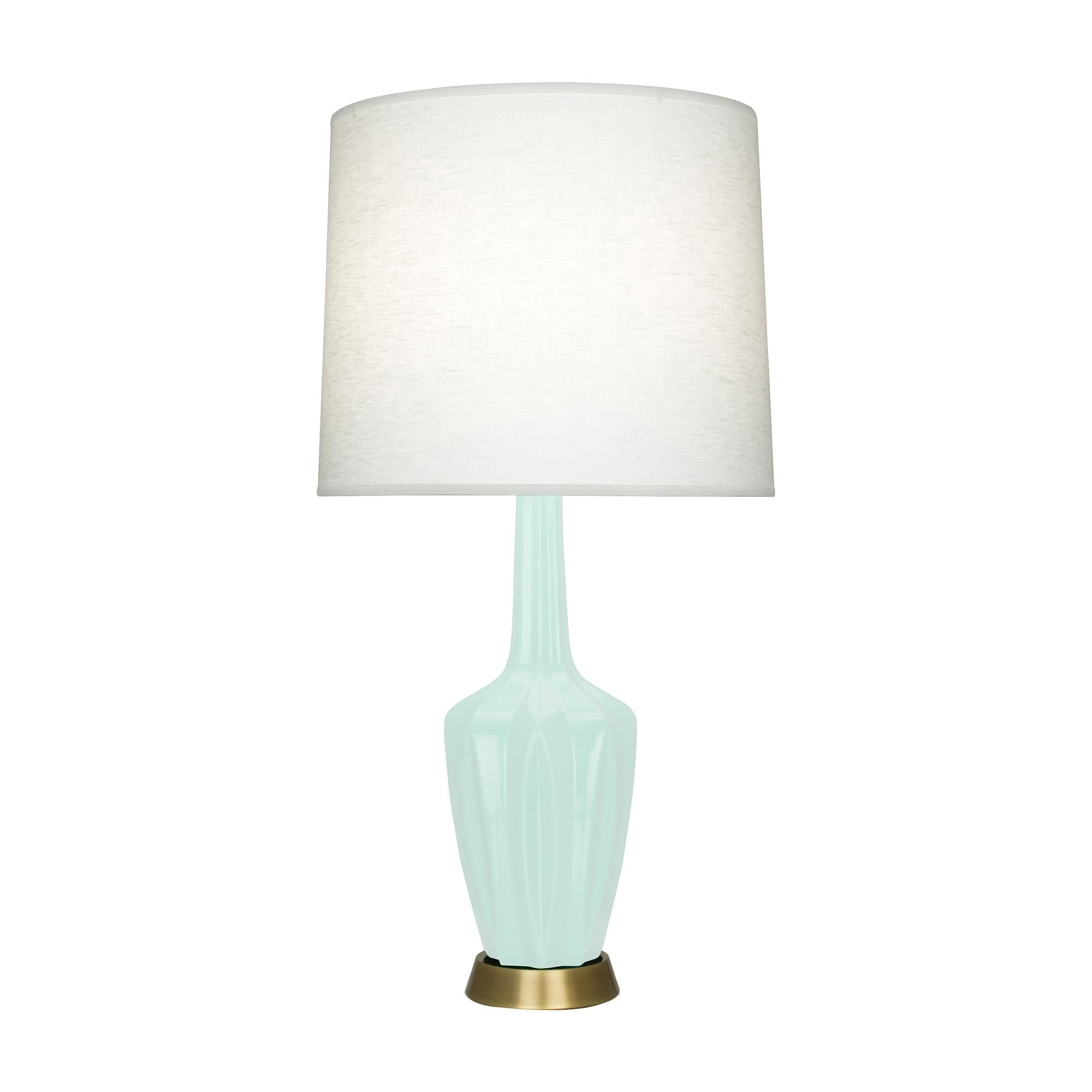 Shown in Mint Glazed finish and Oyster Linen shade and Warm Brass accent