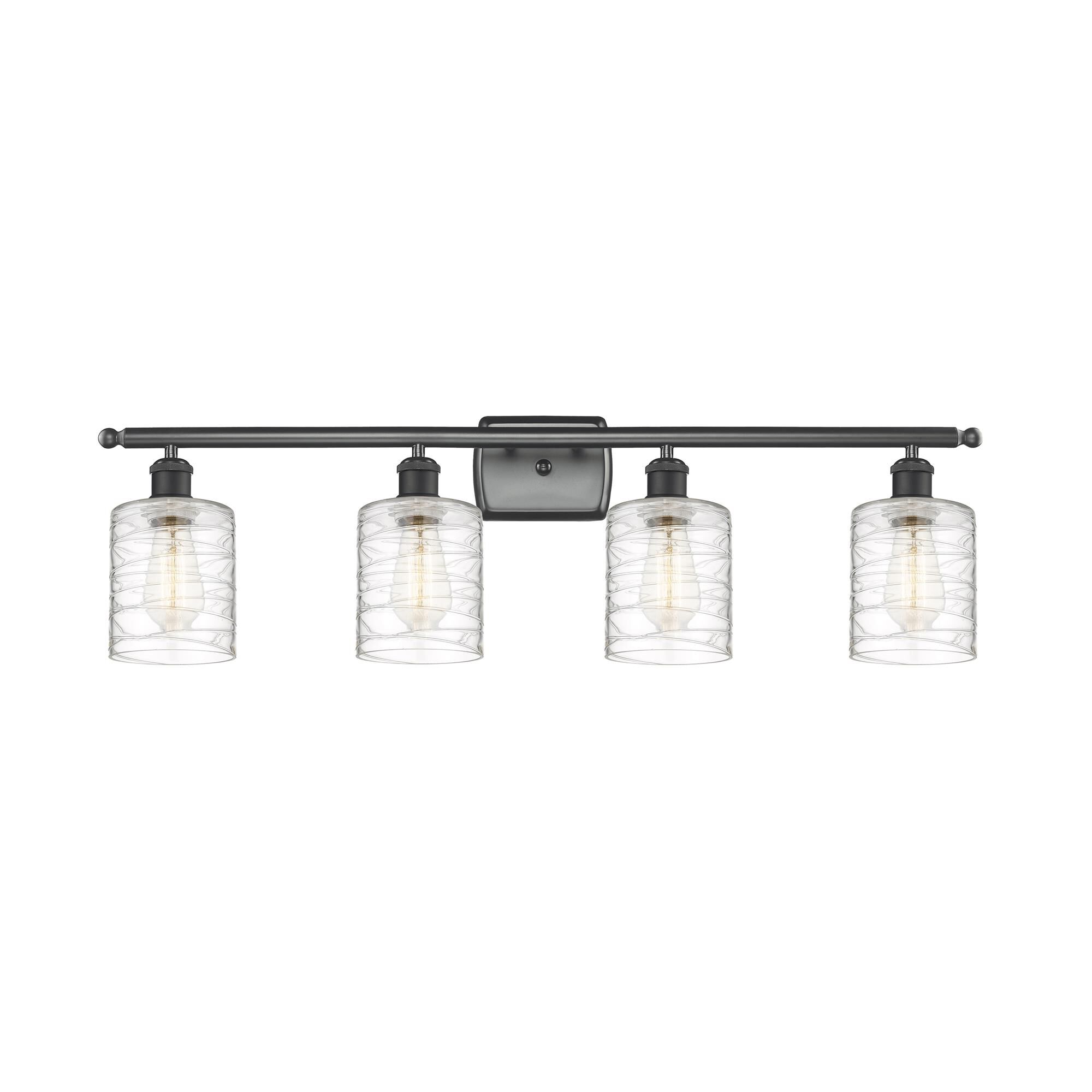 Shown in Matte Black finish and Deco Swirl Cobbleskill glass