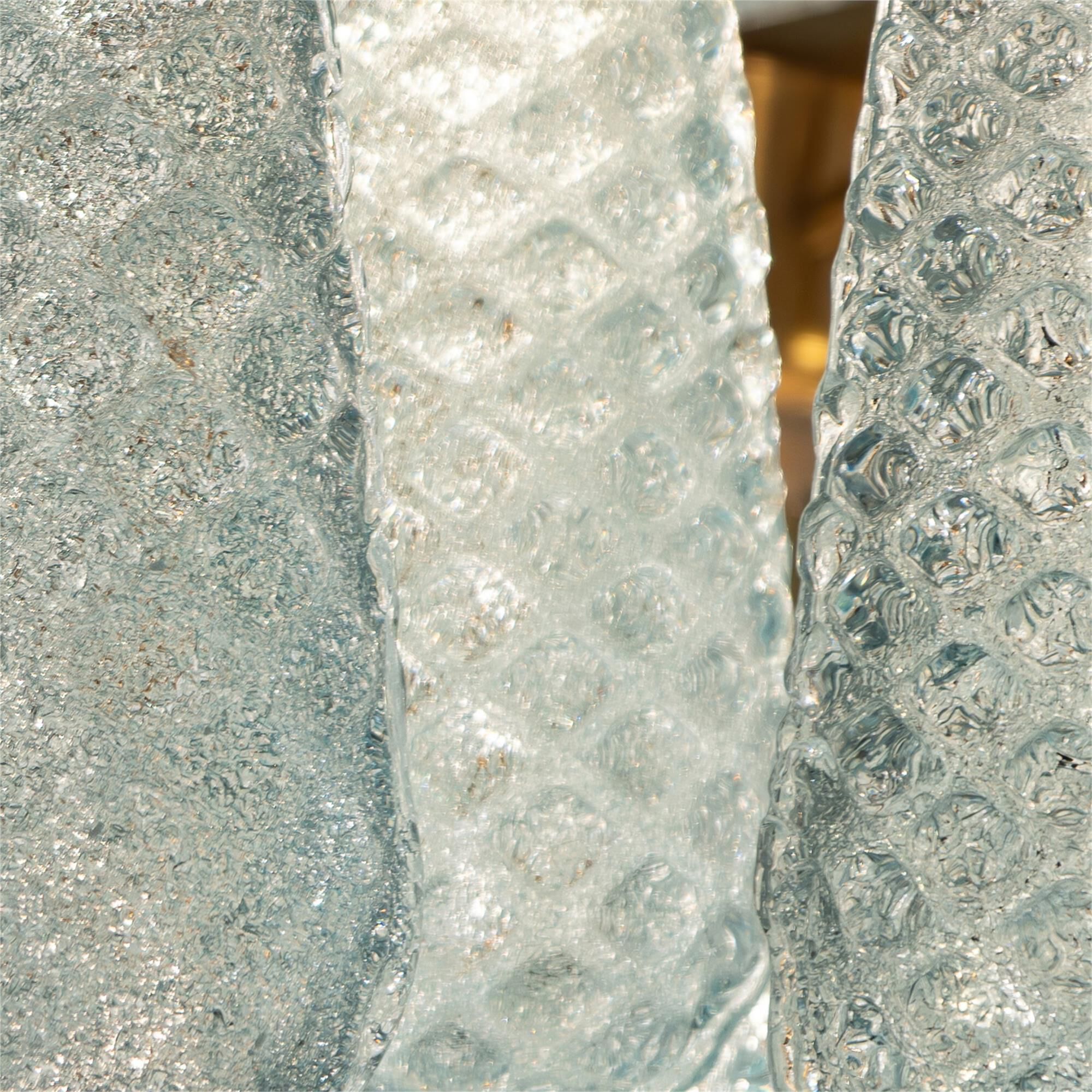 Shown in Aged Brass finish and Sand Blue glass