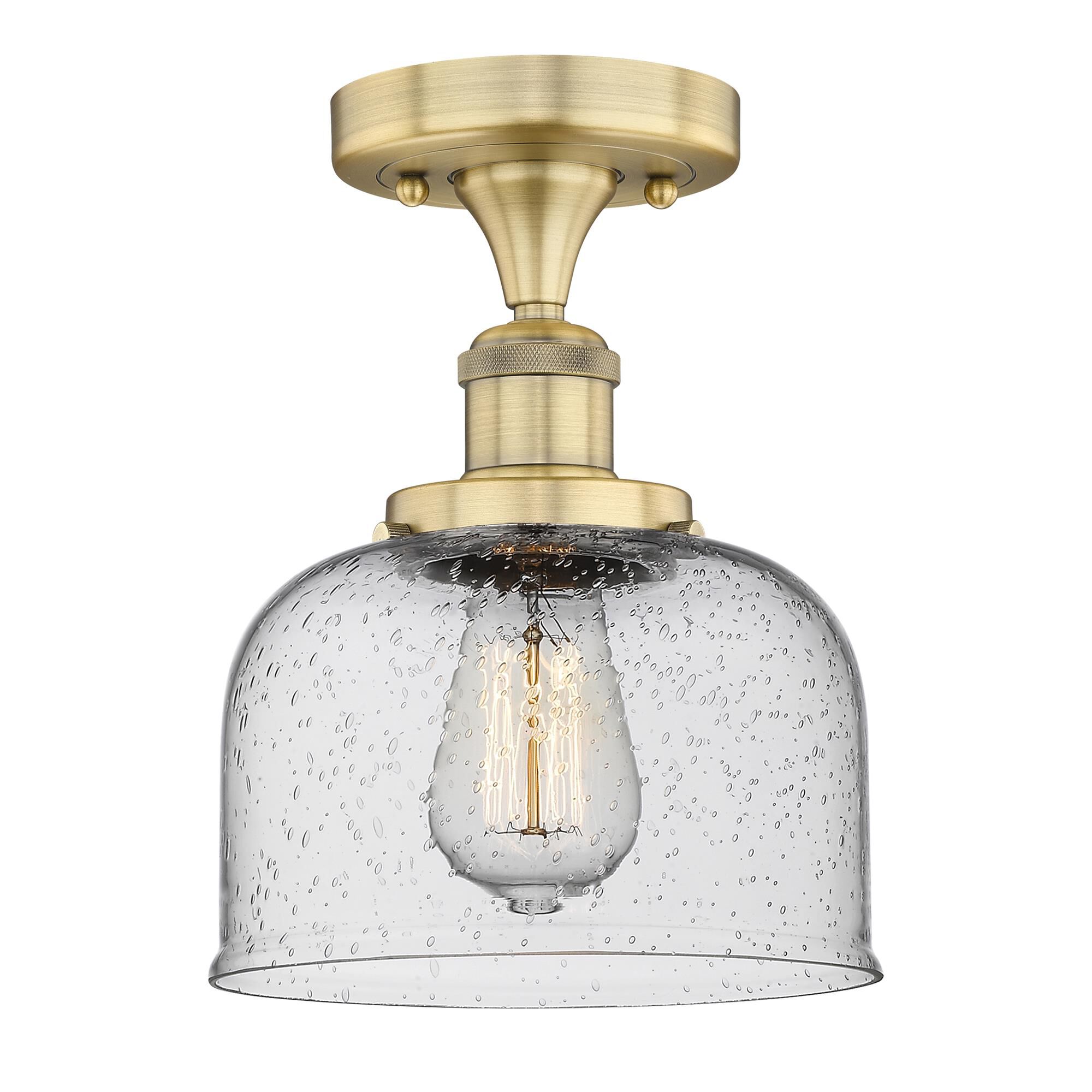 Shown in Brushed Brass finish and Seedy glass