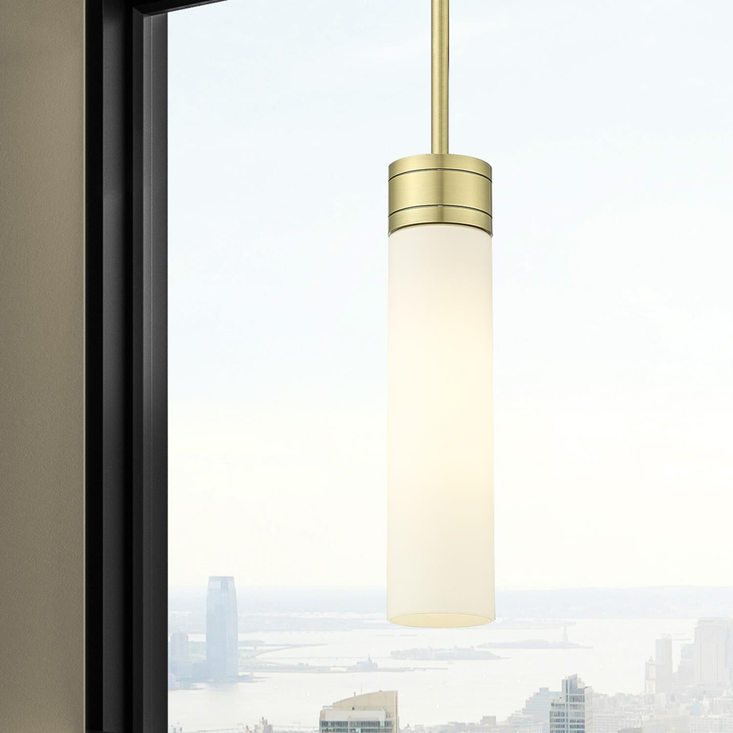 Shown in Antique Brass finish and White glass