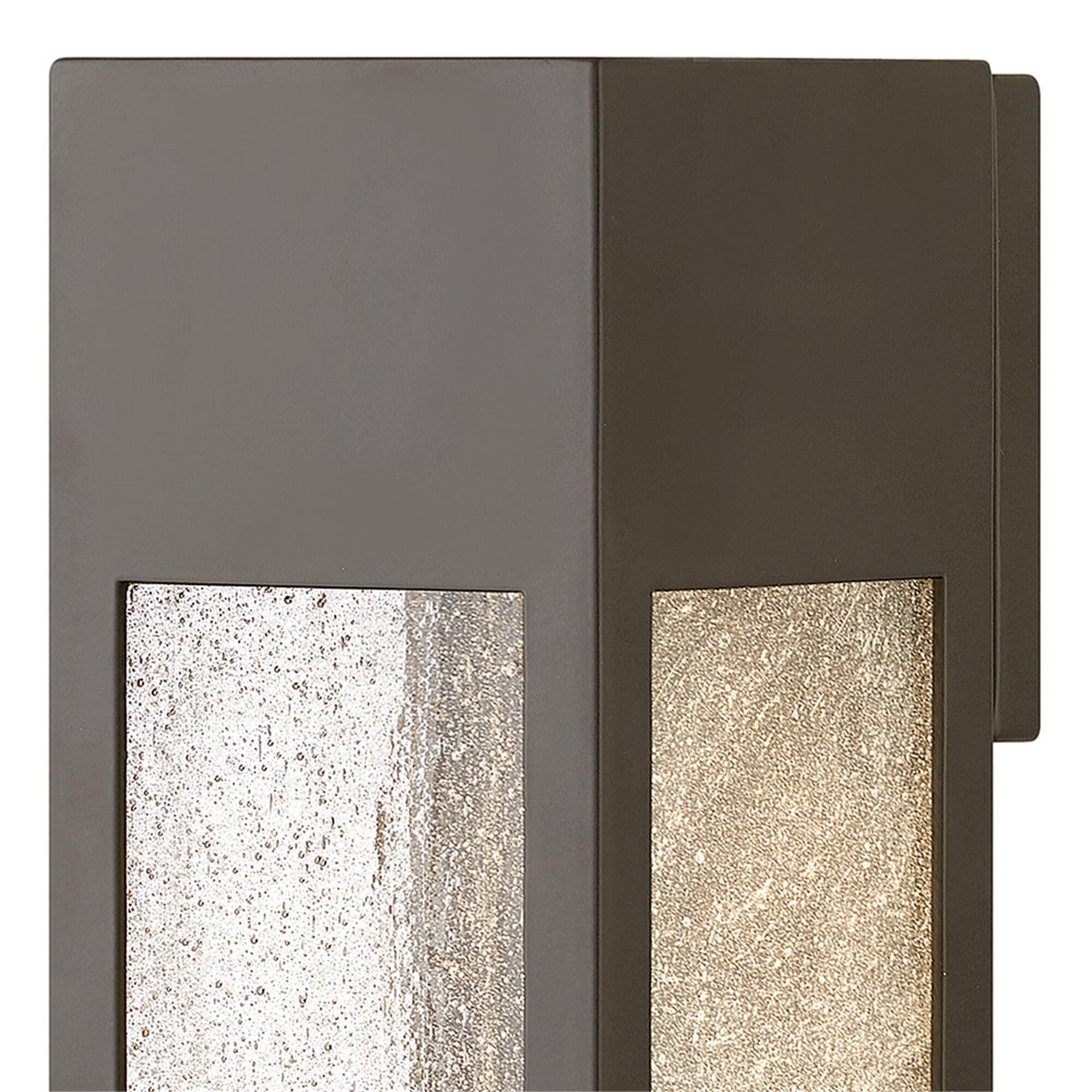Shown in Bronze finish and Clear Seedy glass