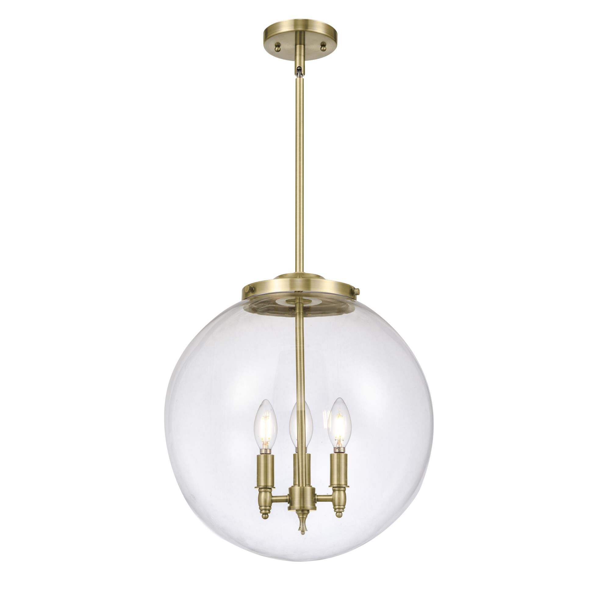 Shown in Antique Brass finish and Clear Beacon glass