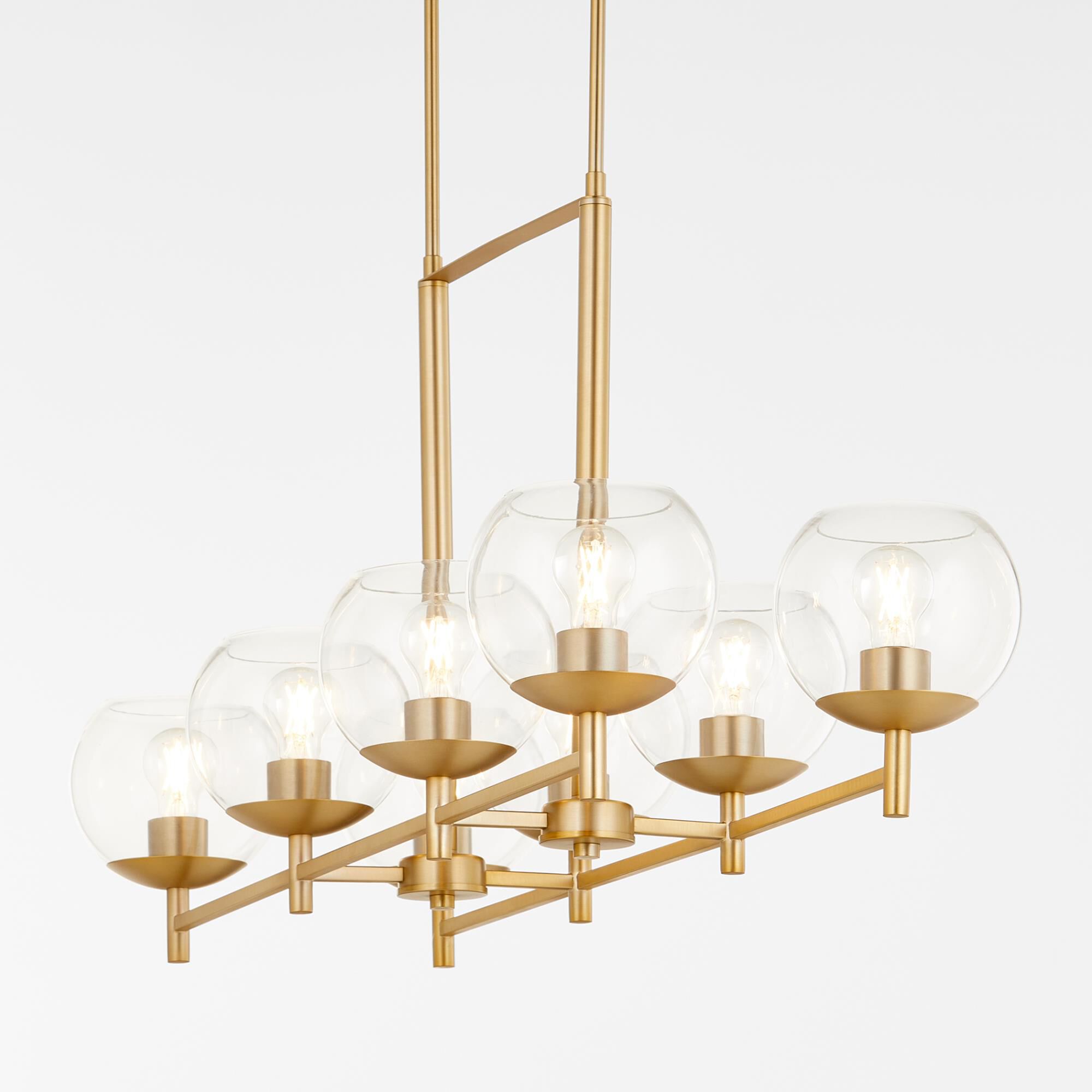 Shown in Aged Brass finish and Clear glass