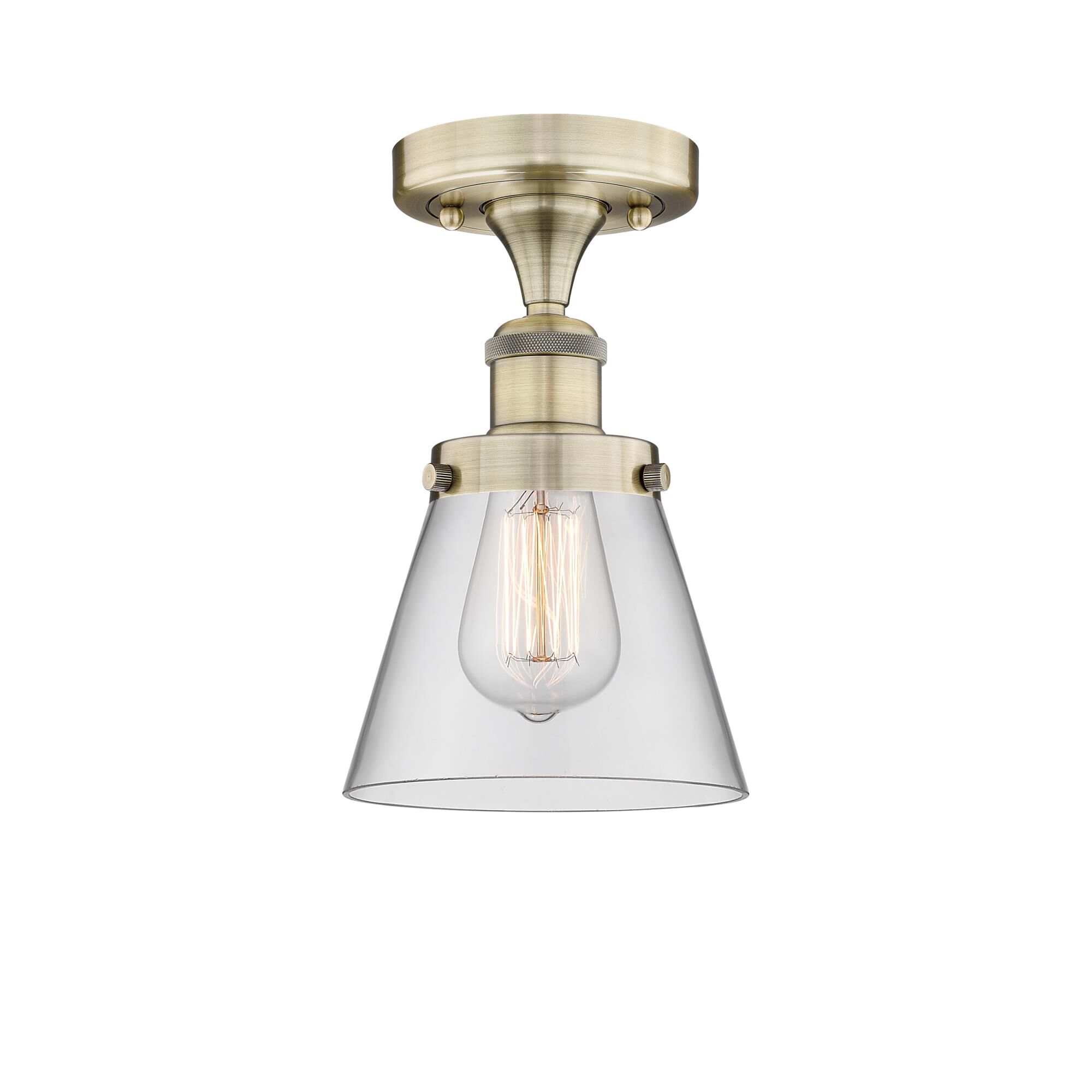 Shown in Antique Brass finish and Clear glass