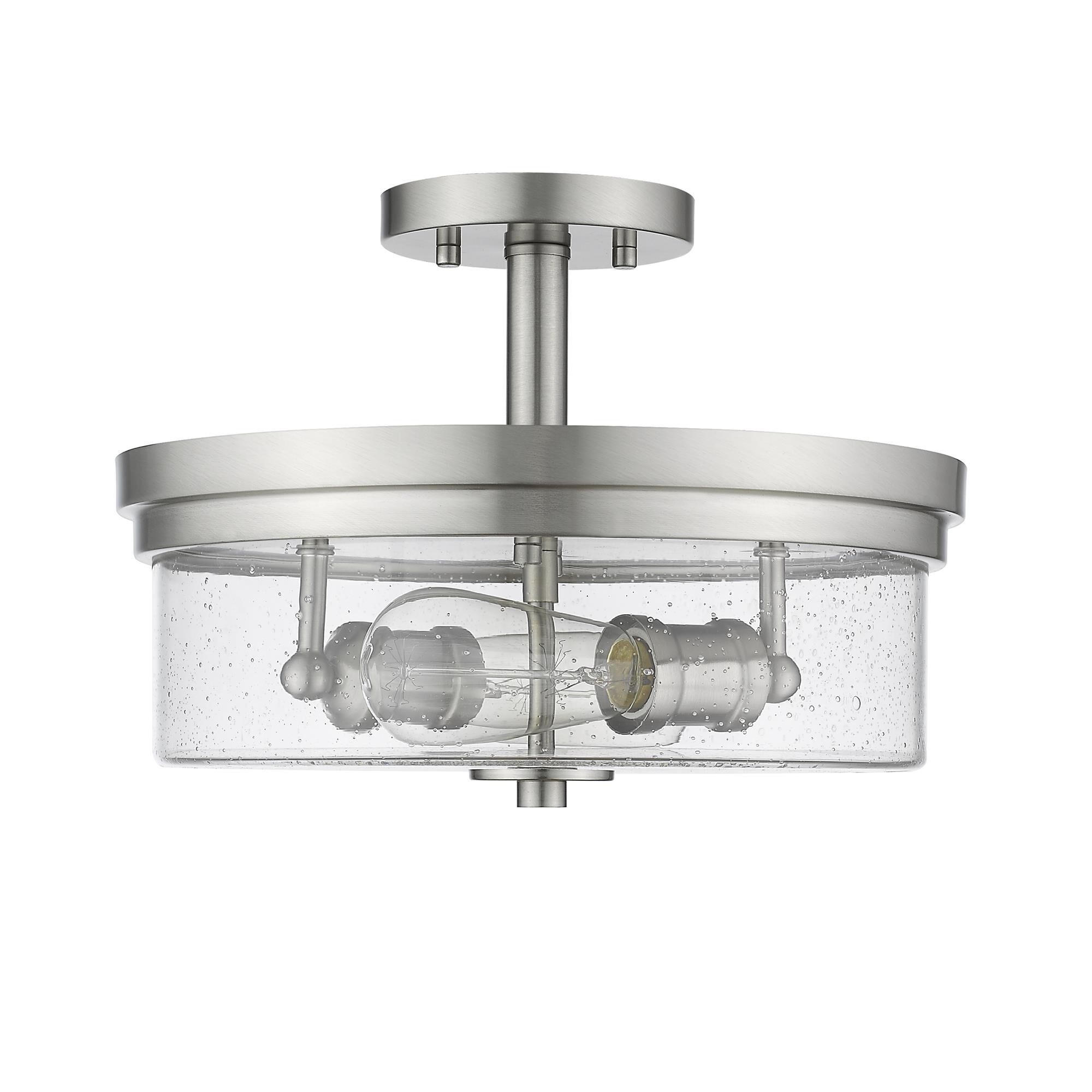 Shown in Brushed Nickel finish and Glass shade