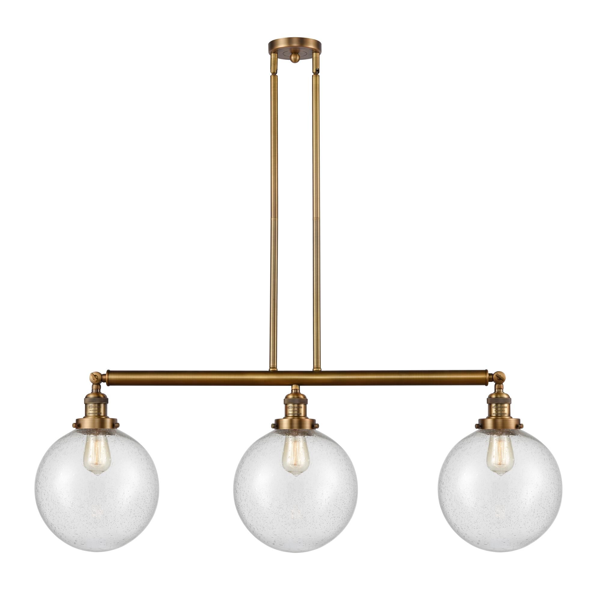 Shown in Brushed Brass finish and Seedy Beacon glass
