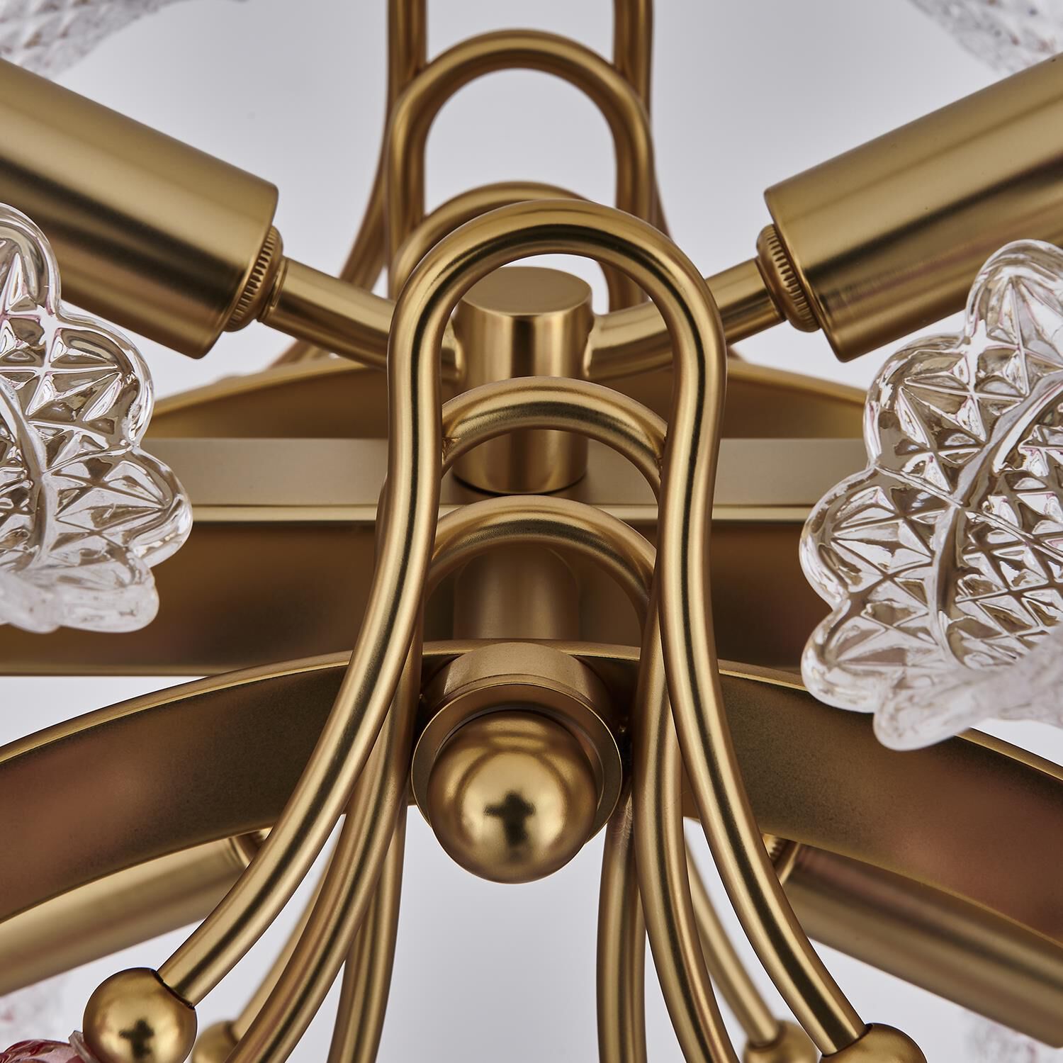 Shown in Antique Brass finish and Vintage Rose crystal