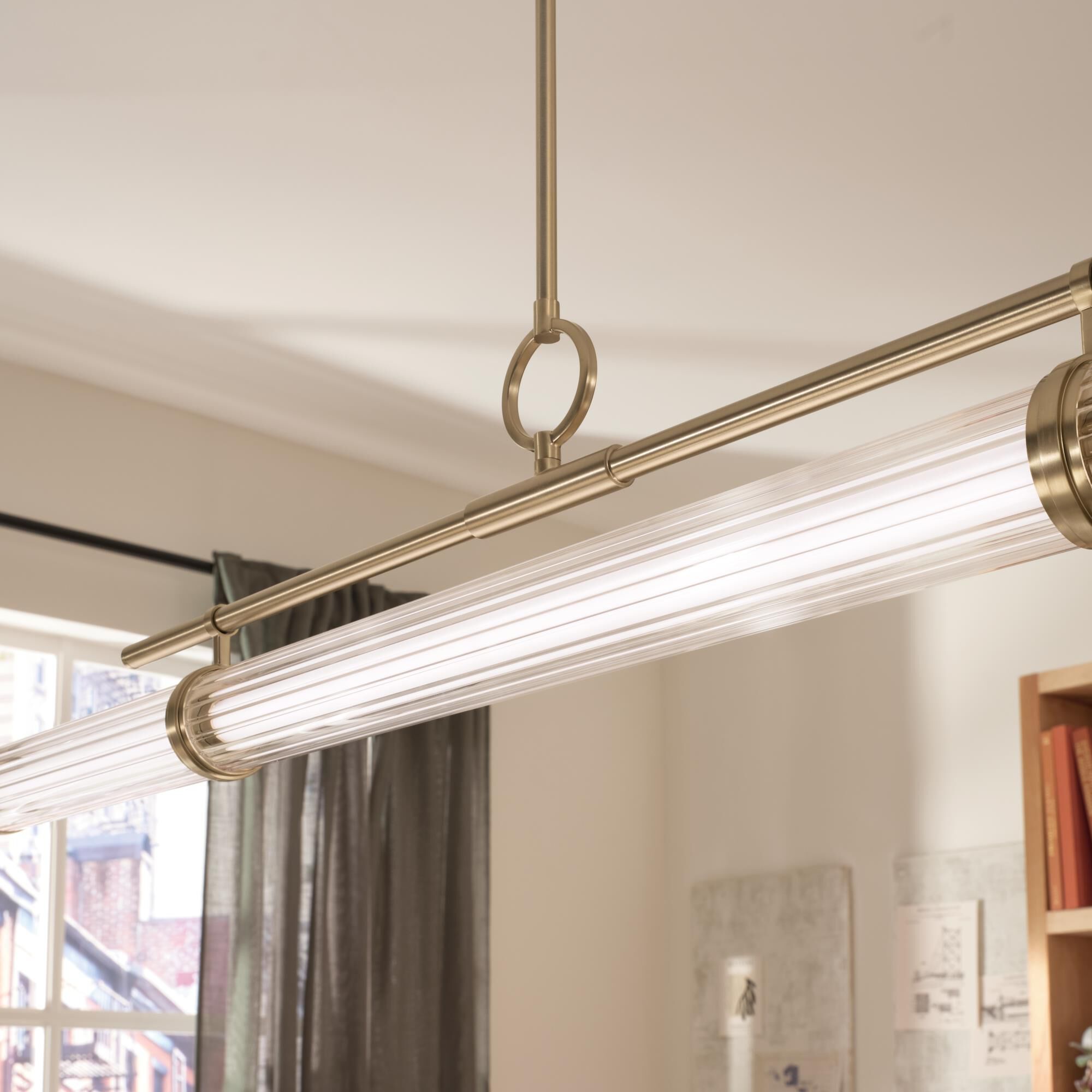 Shown in Champagne Bronze finish and Clear Fluted glass