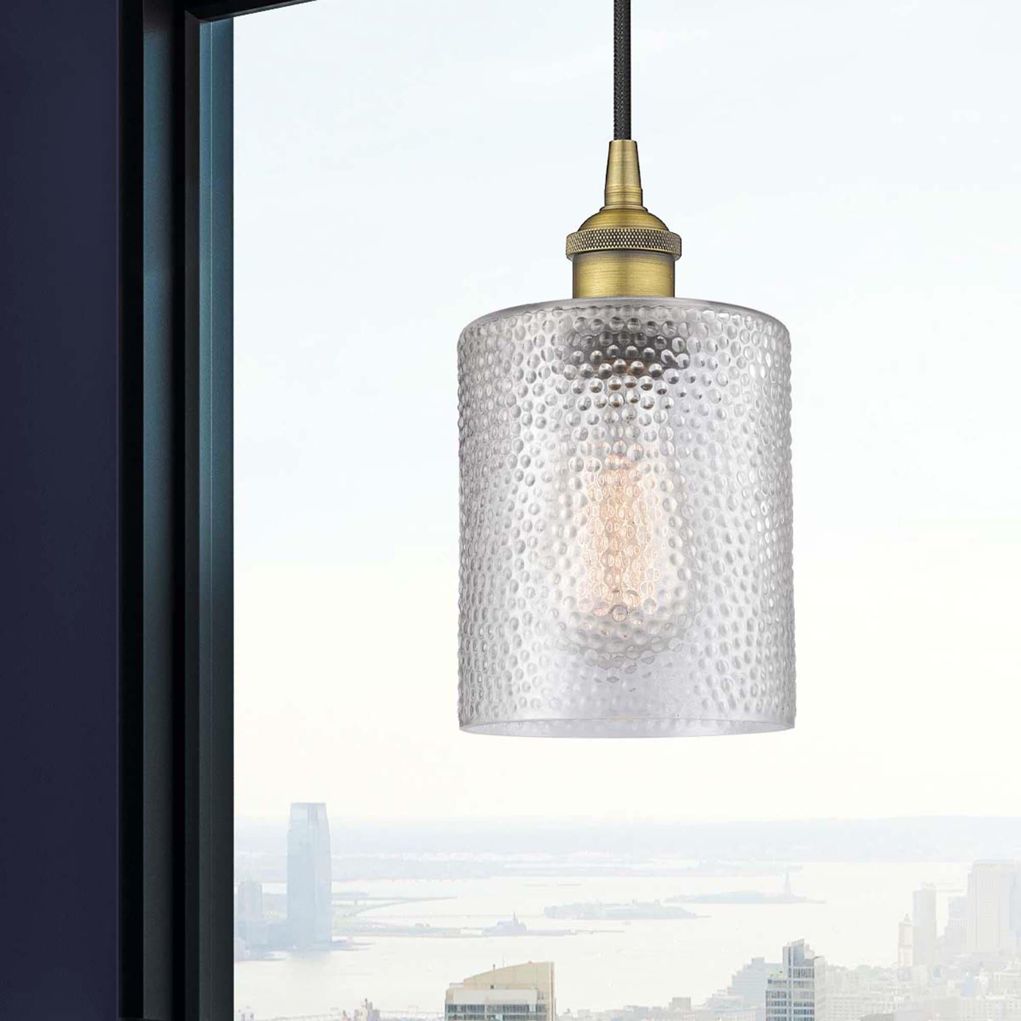 Shown in Brushed Brass finish and Clear glass
