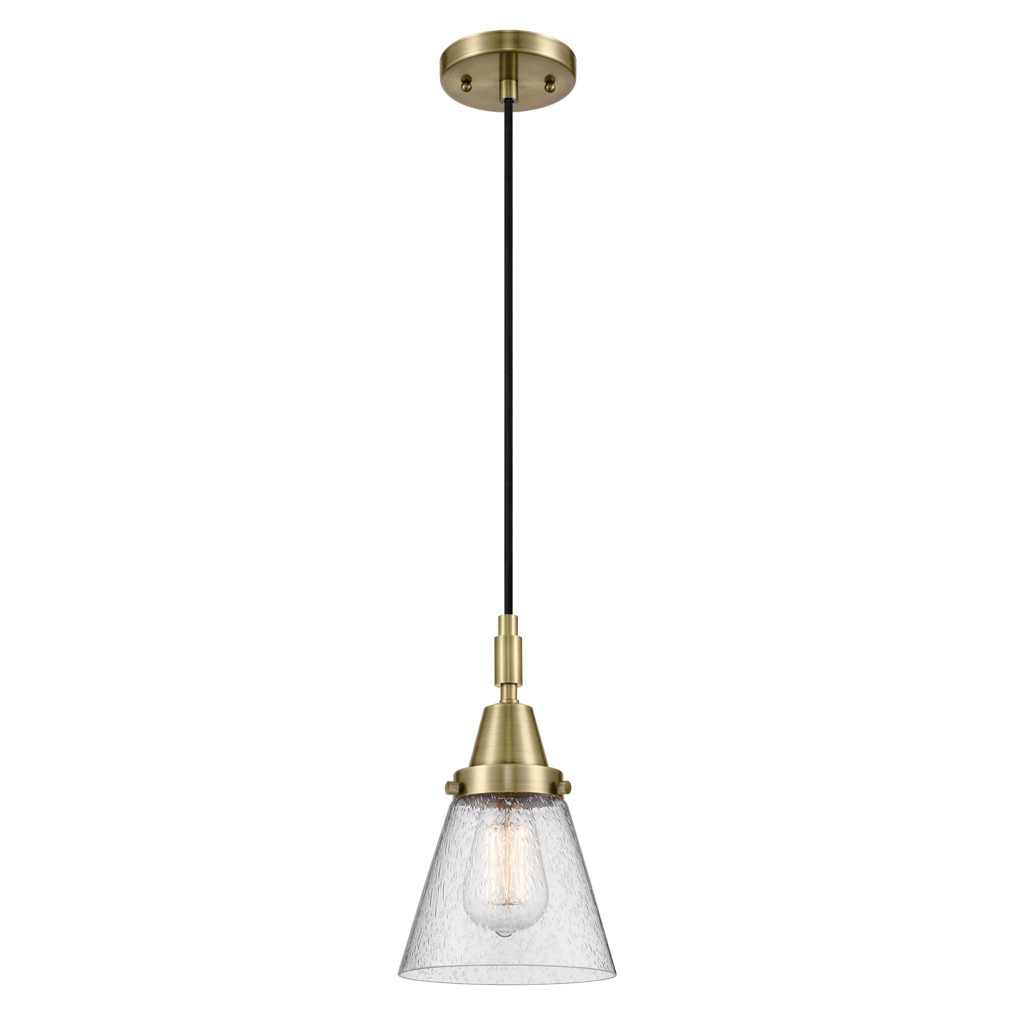 Shown in Antique Brass finish and Seedy glass