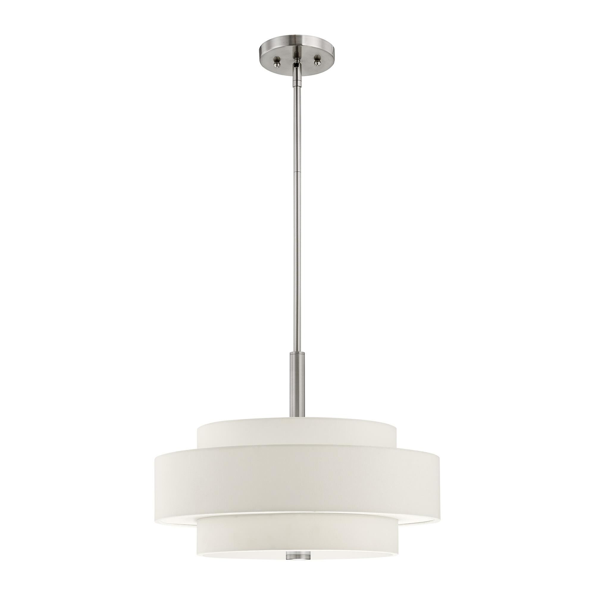 Shown in Brushed Nickel finish and Hand Crafted Off-White Fabric Hardback shade