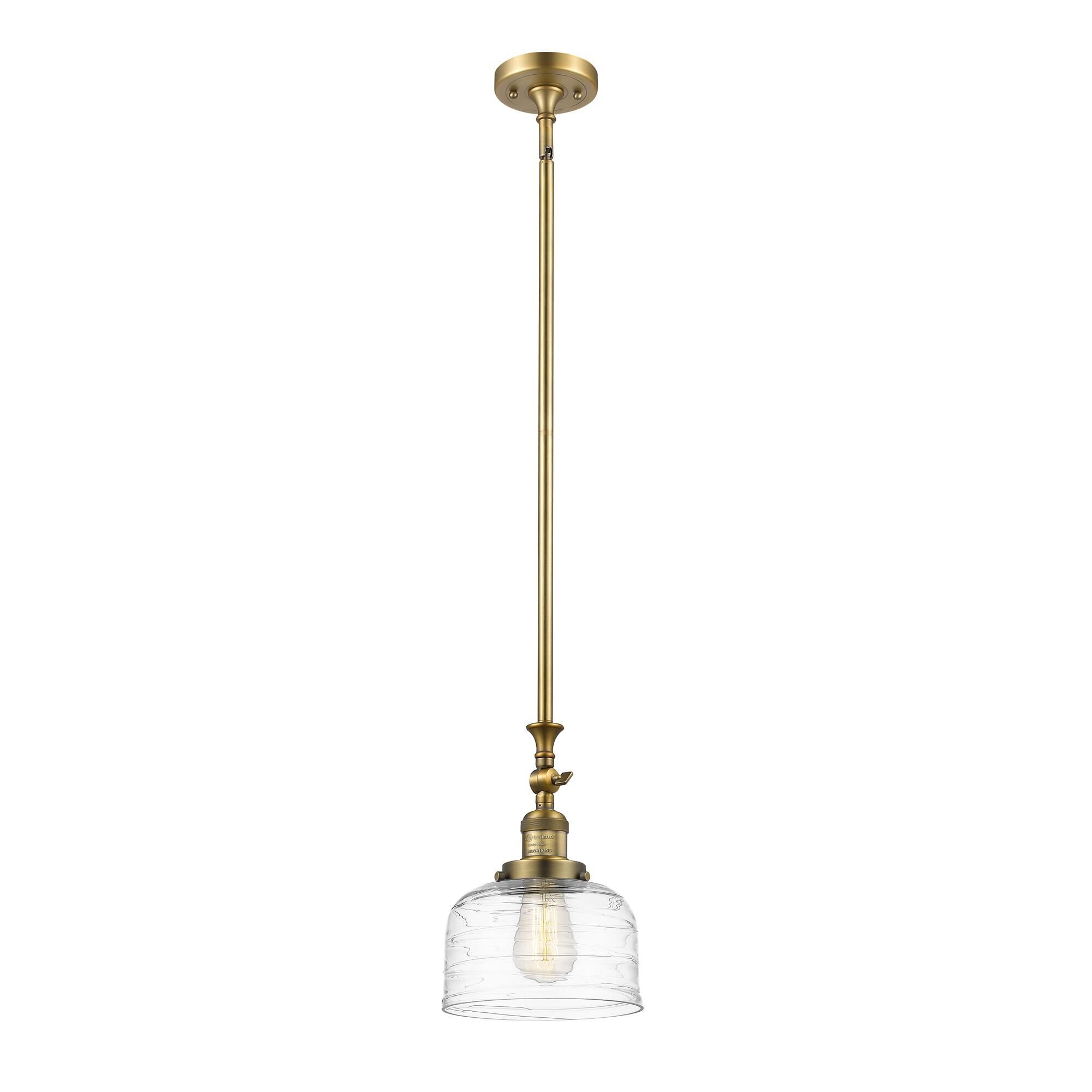 Shown in Brushed Brass finish and Clear Deco Swirl Large Bell glass