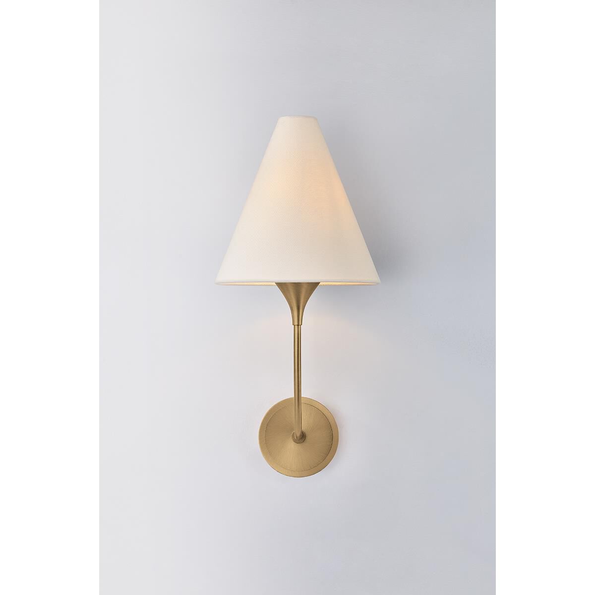 Shown in Patina Brass finish and Off White Linen shade