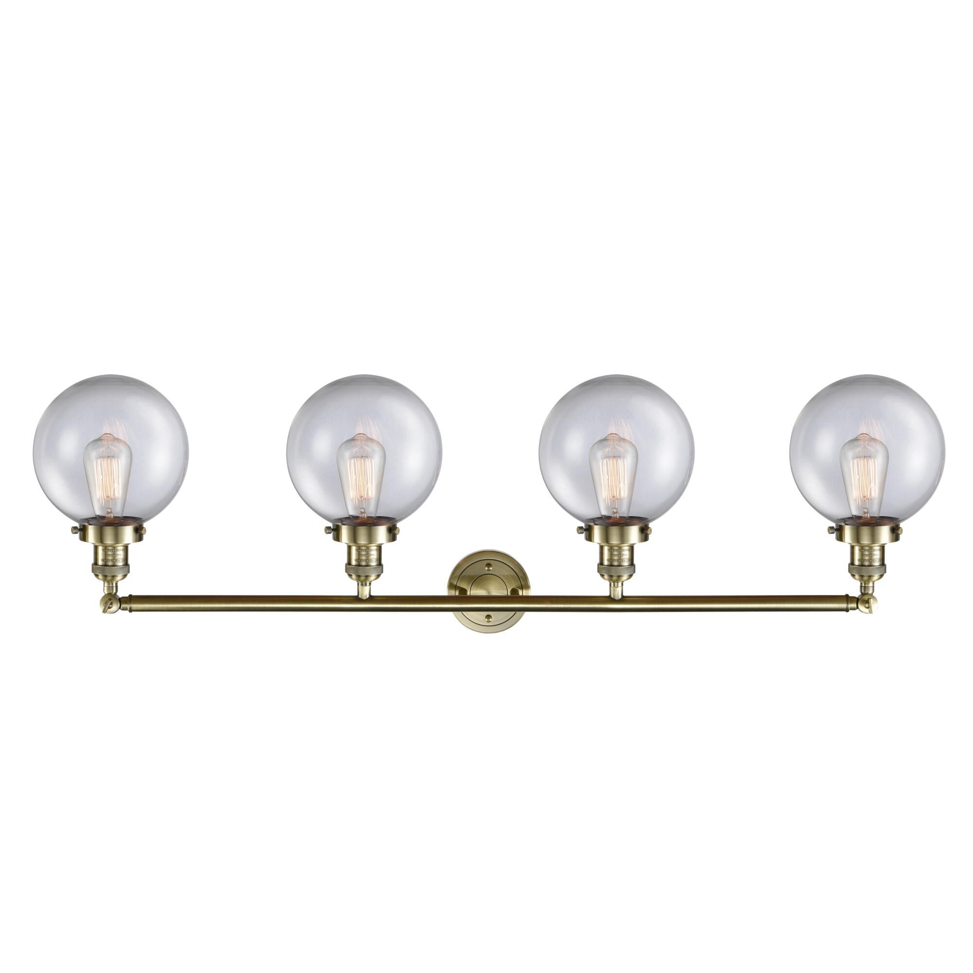 Shown in Antique Brass finish and Clear Beacon glass