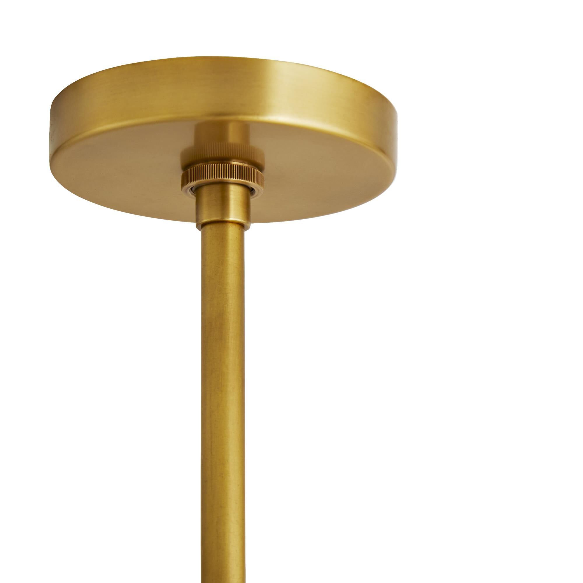 Shown in Antique Brass finish and Linen shade
