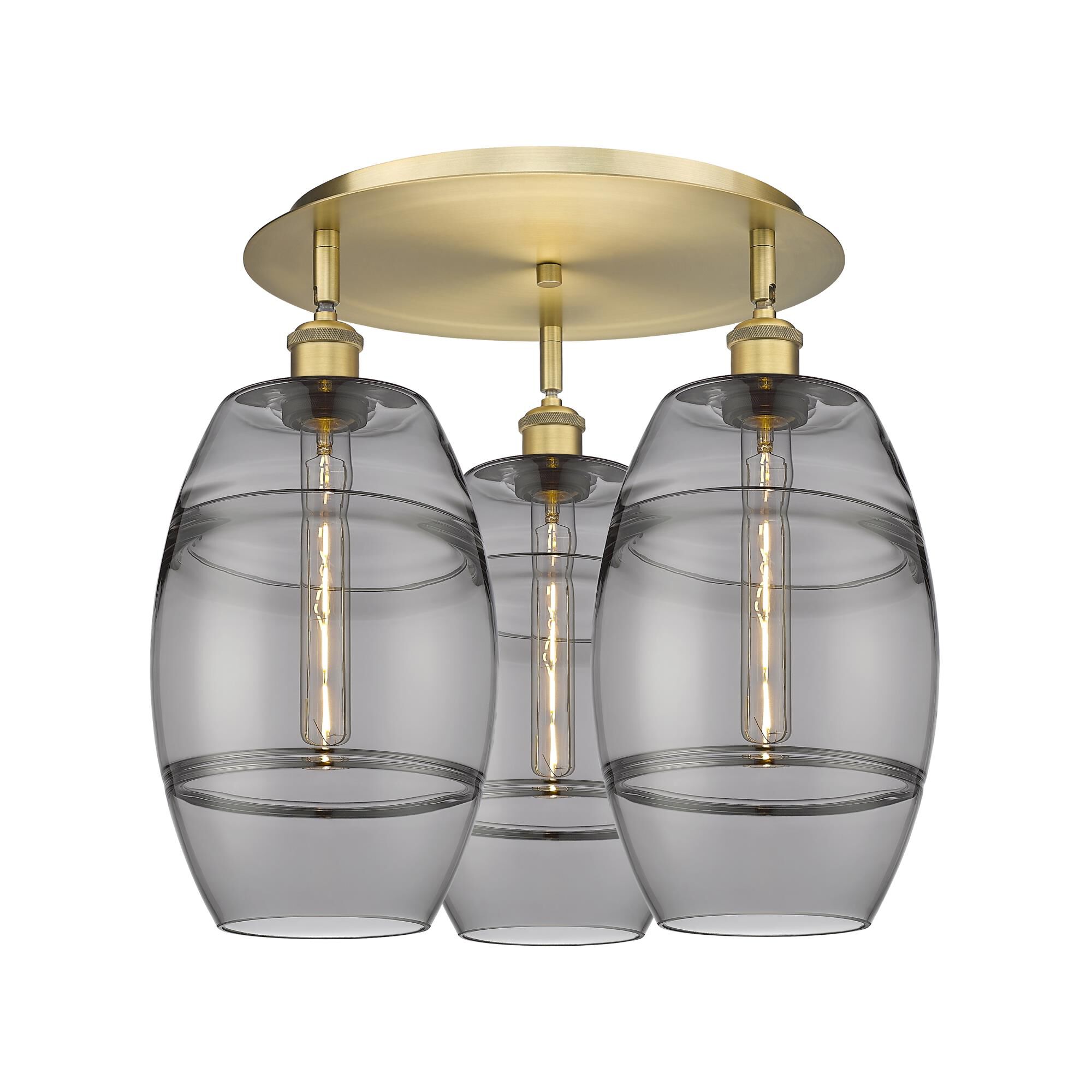 Shown in Brushed Brass finish and Light Smoke glass