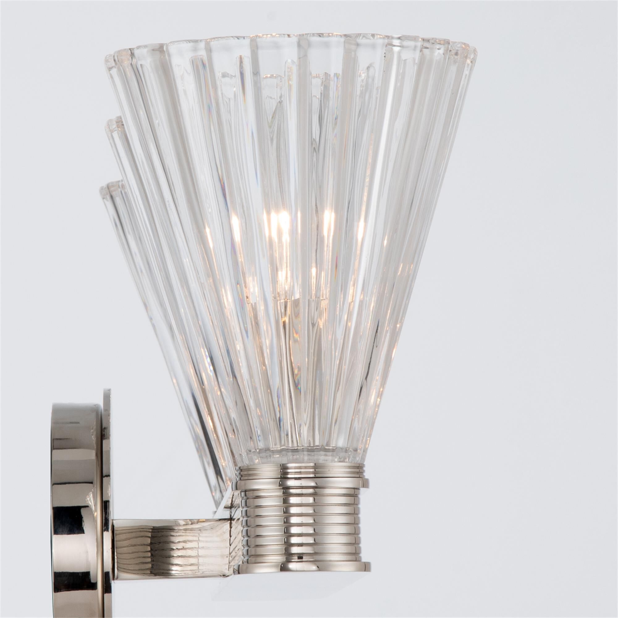 Shown in Polished Nickel finish and Glass shade