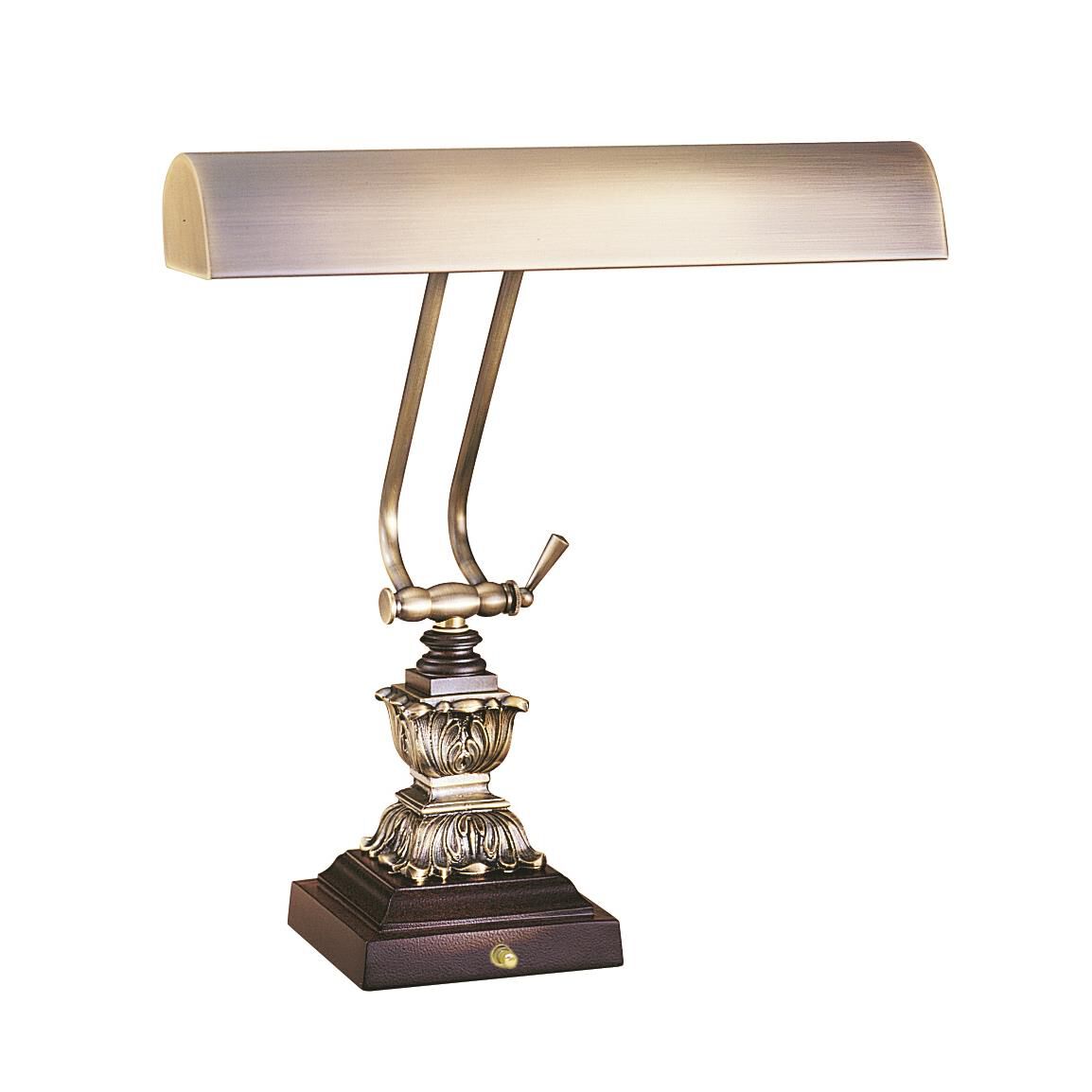 Shown in Antique Brass finish and Metal shade