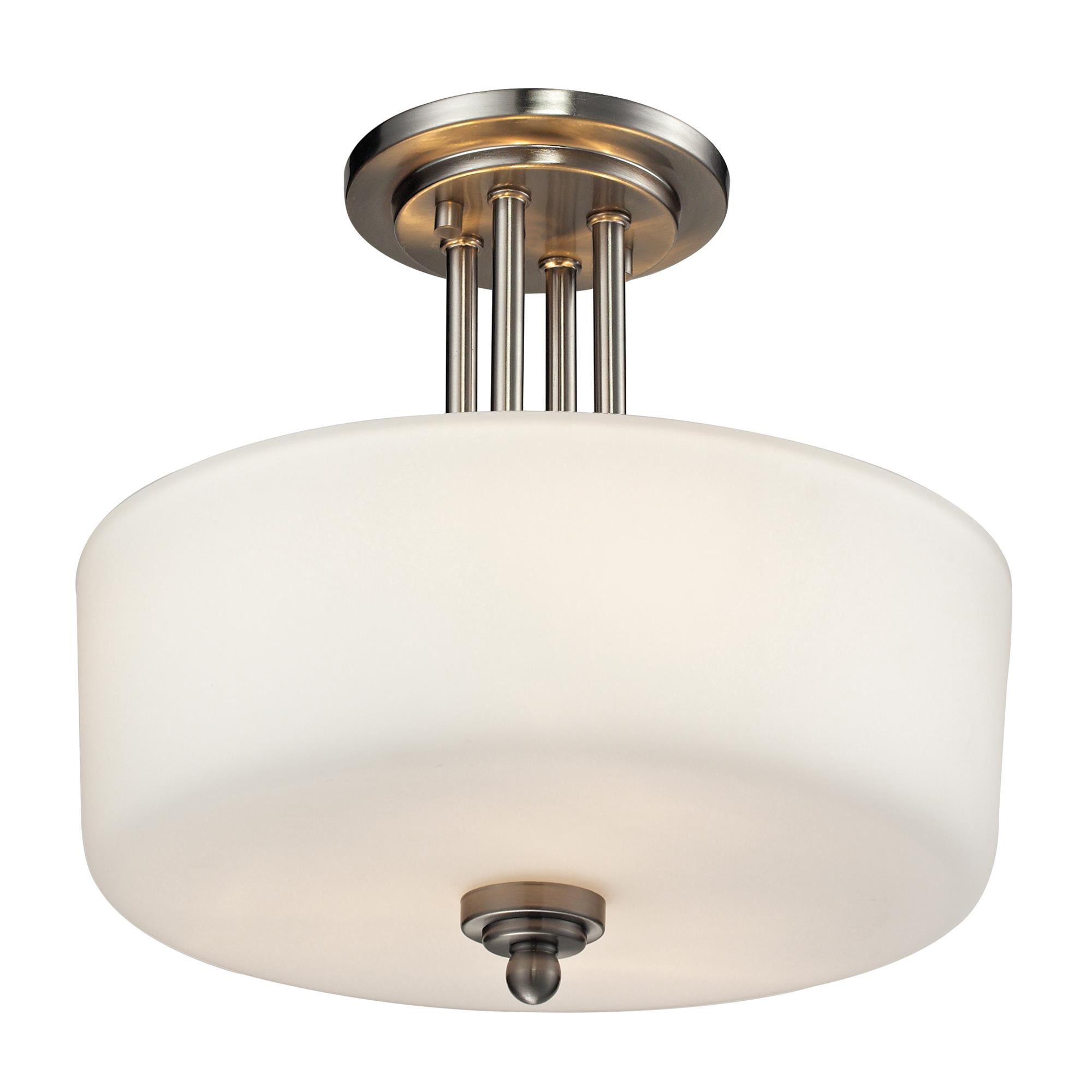 Shown in Brushed Nickel finish and Glass shade