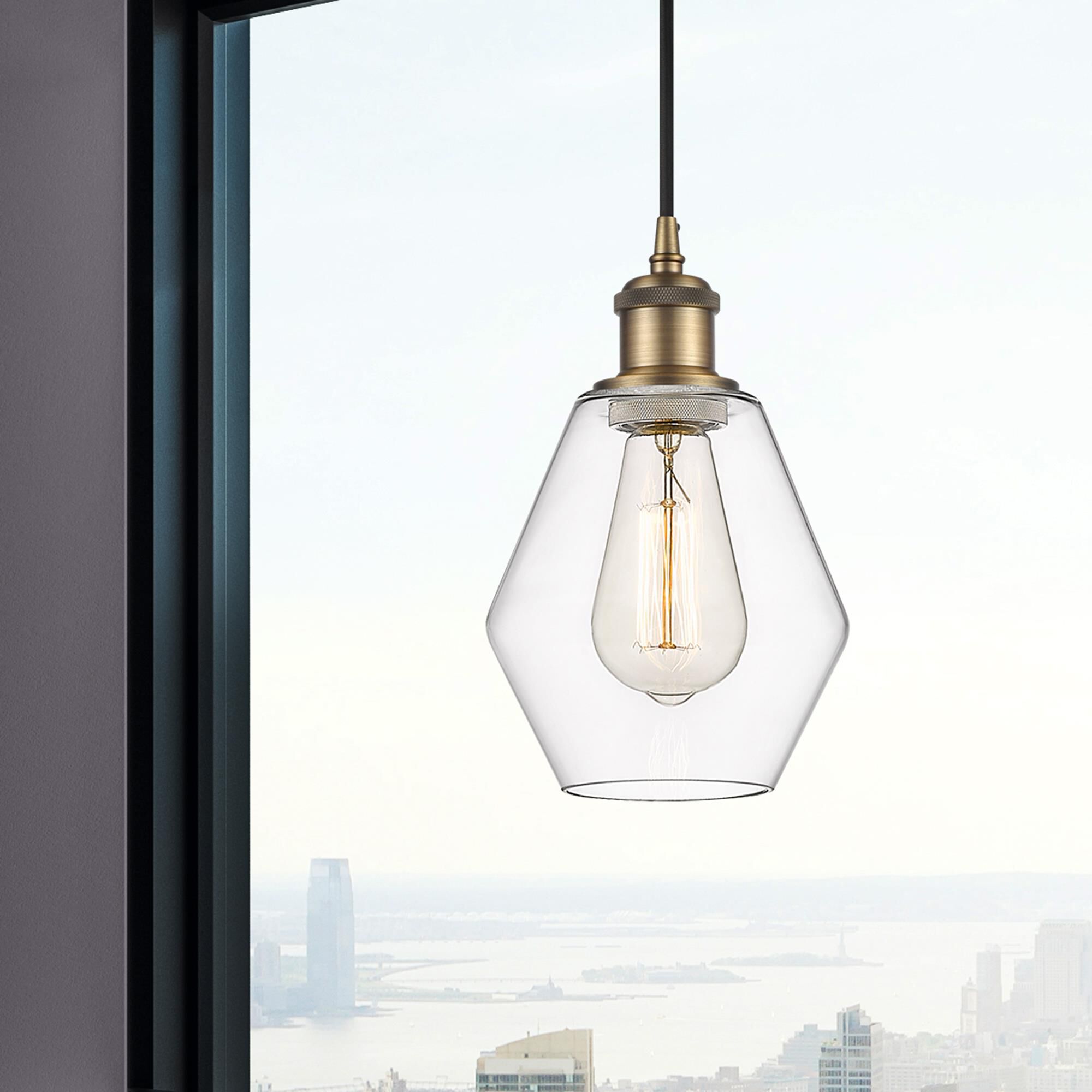 Shown in Brushed Brass finish and Clear glass