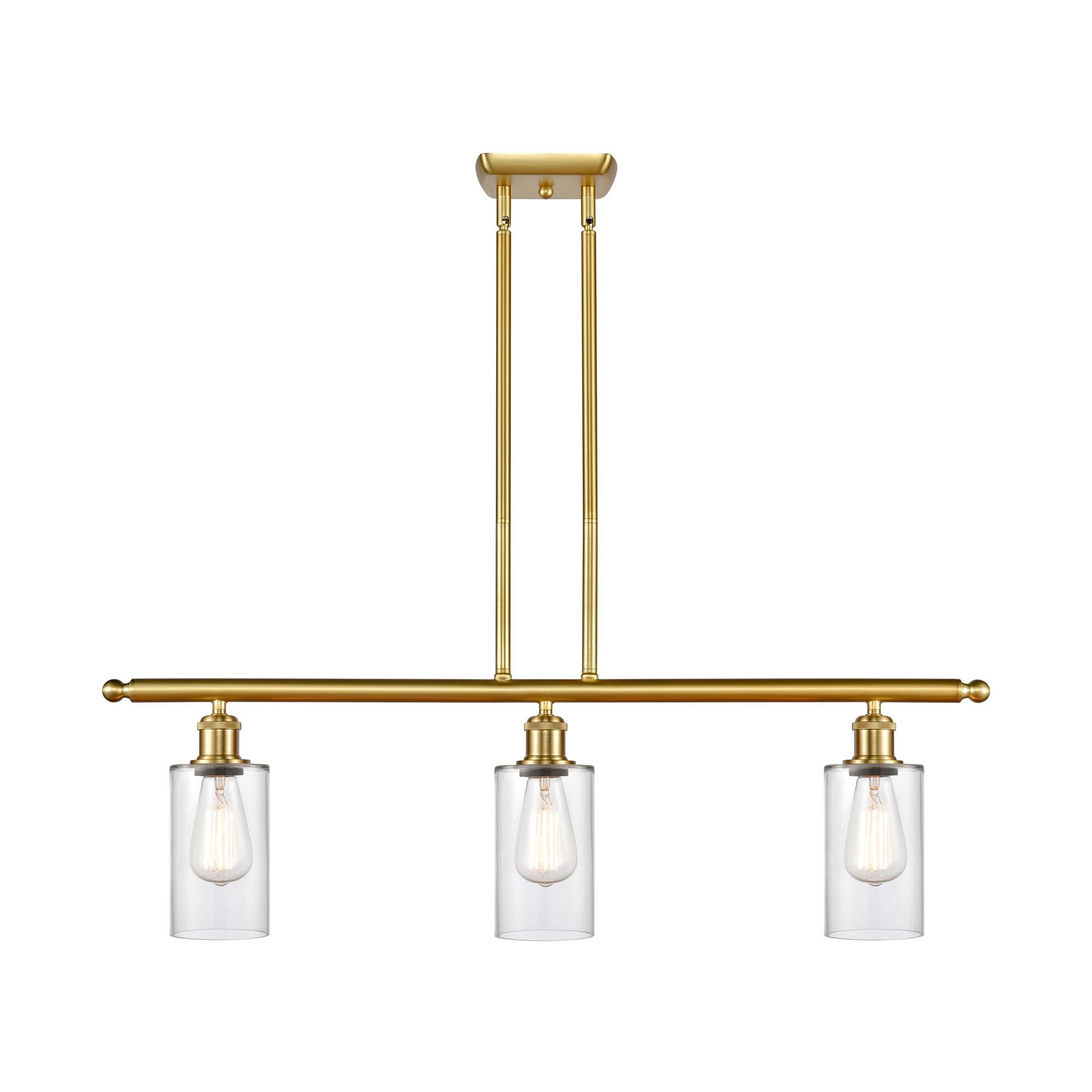 Shown in Satin Gold finish and Drum glass and Glass shade