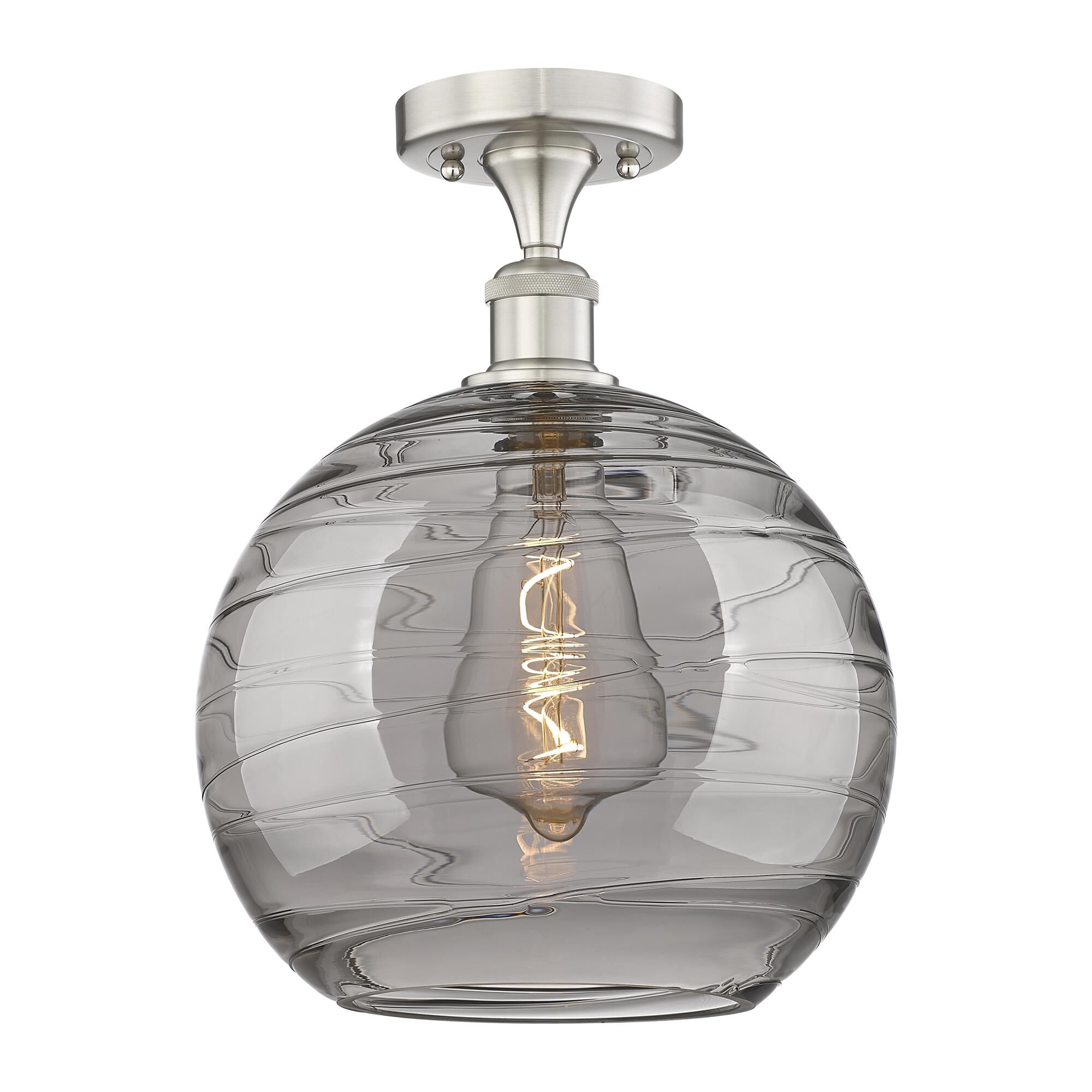 Shown in Brushed Satin Nickel finish and Light Smoke Deco Swirl glass