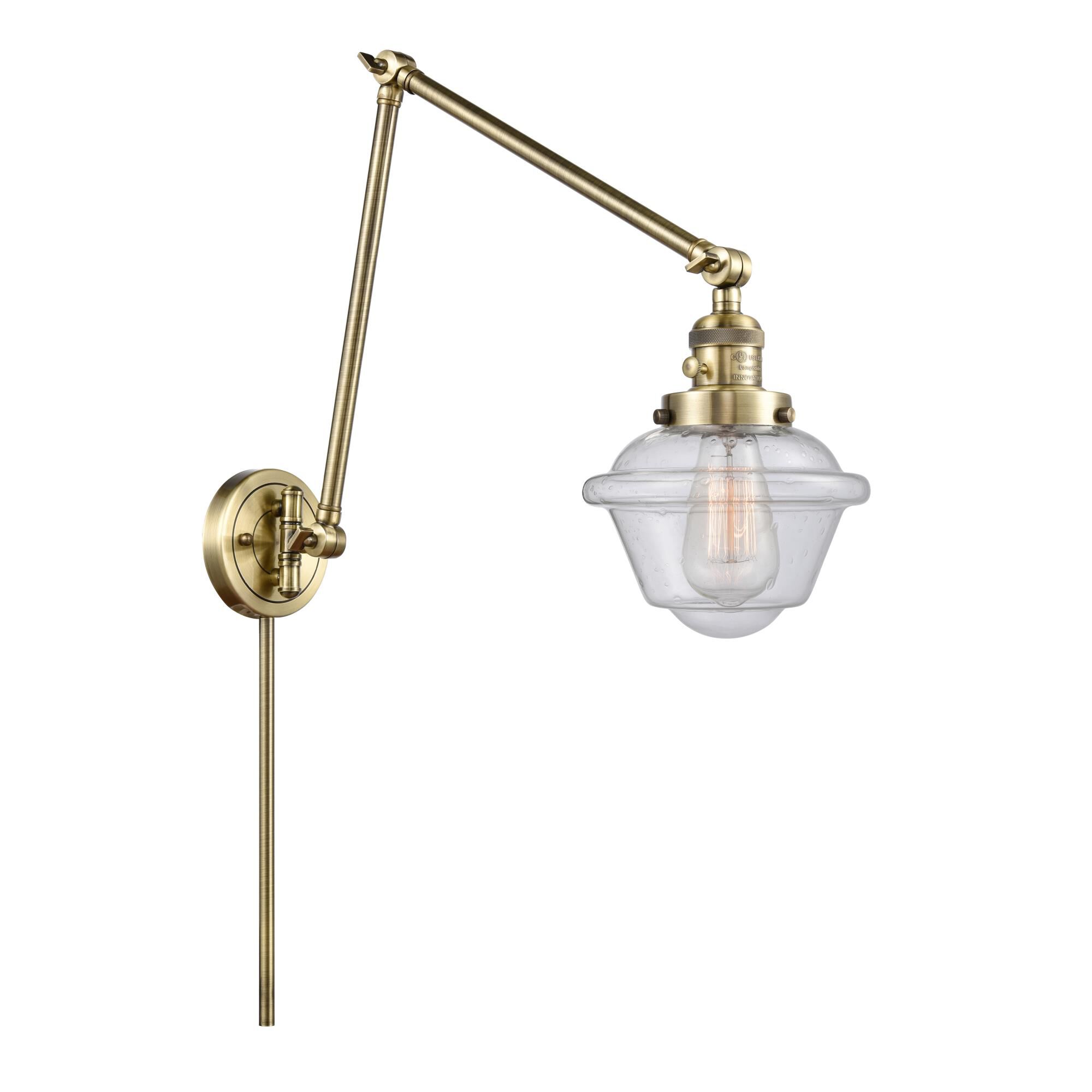 Shown in Antique Brass finish and Seedy Small Oxford glass