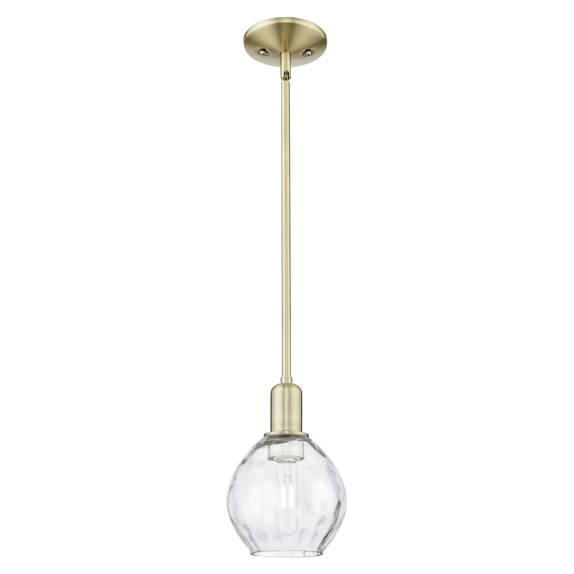 Shown in Antique Brass finish and Clear glass