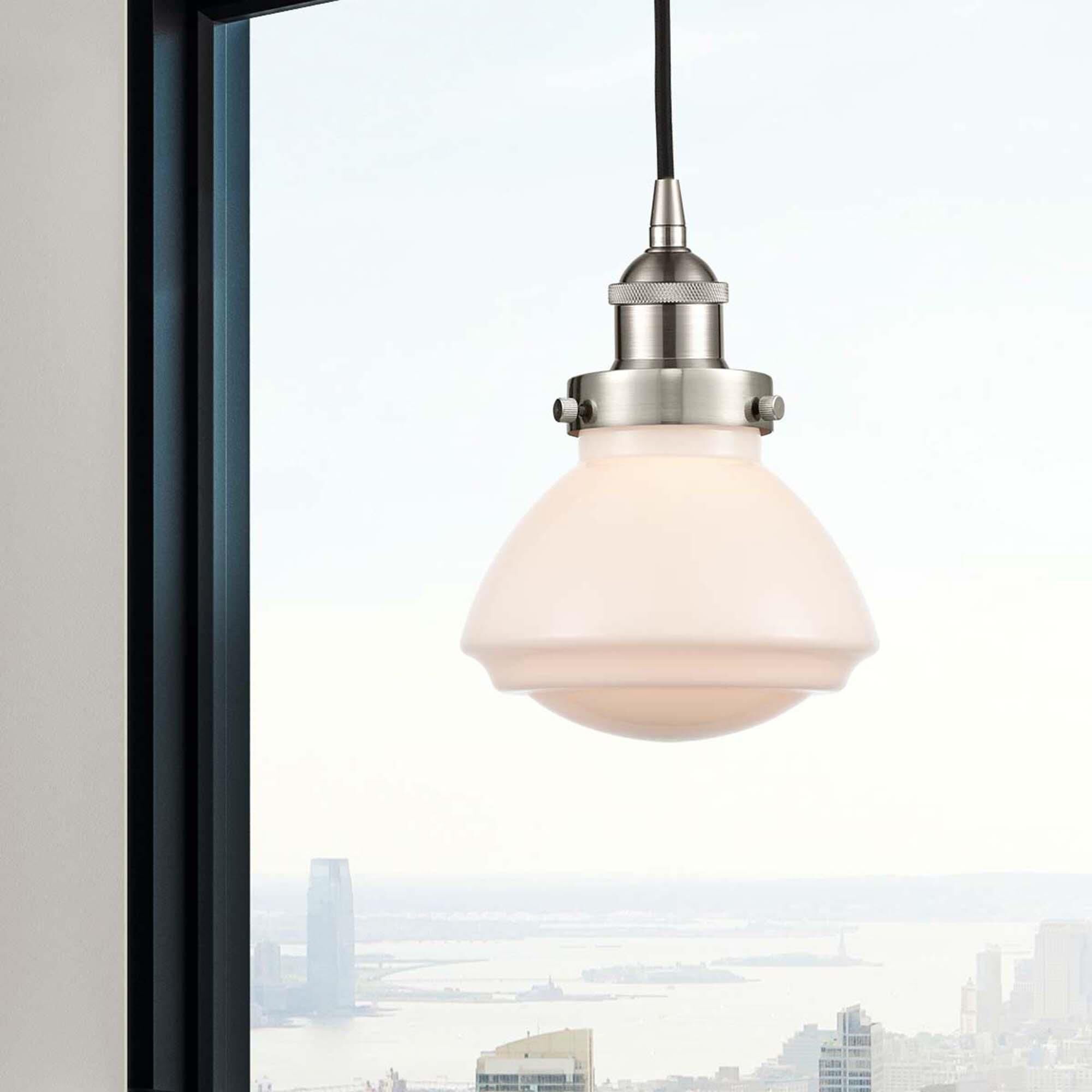 Shown in Brushed Satin Nickel finish and Matte White glass