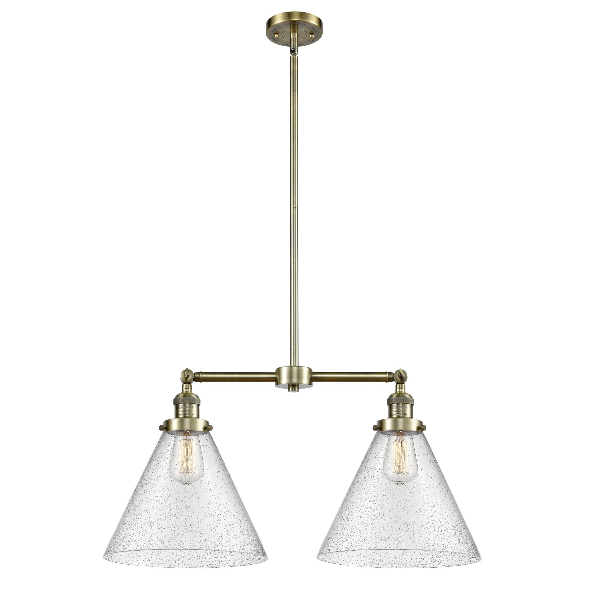 Shown in Antique Brass finish and Seedy glass