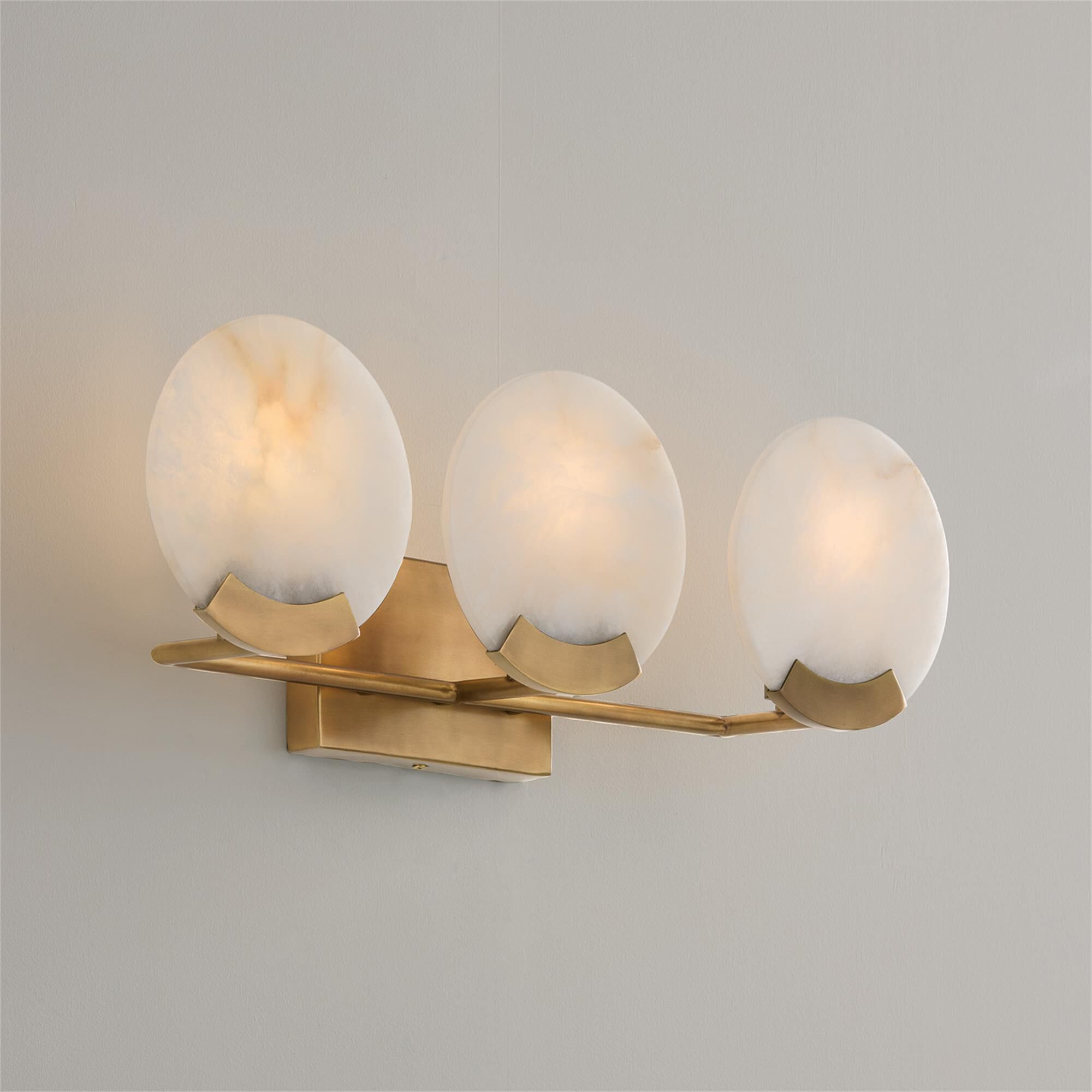 Shown in Aged Brass finish and Natural Alabaster Stone glass