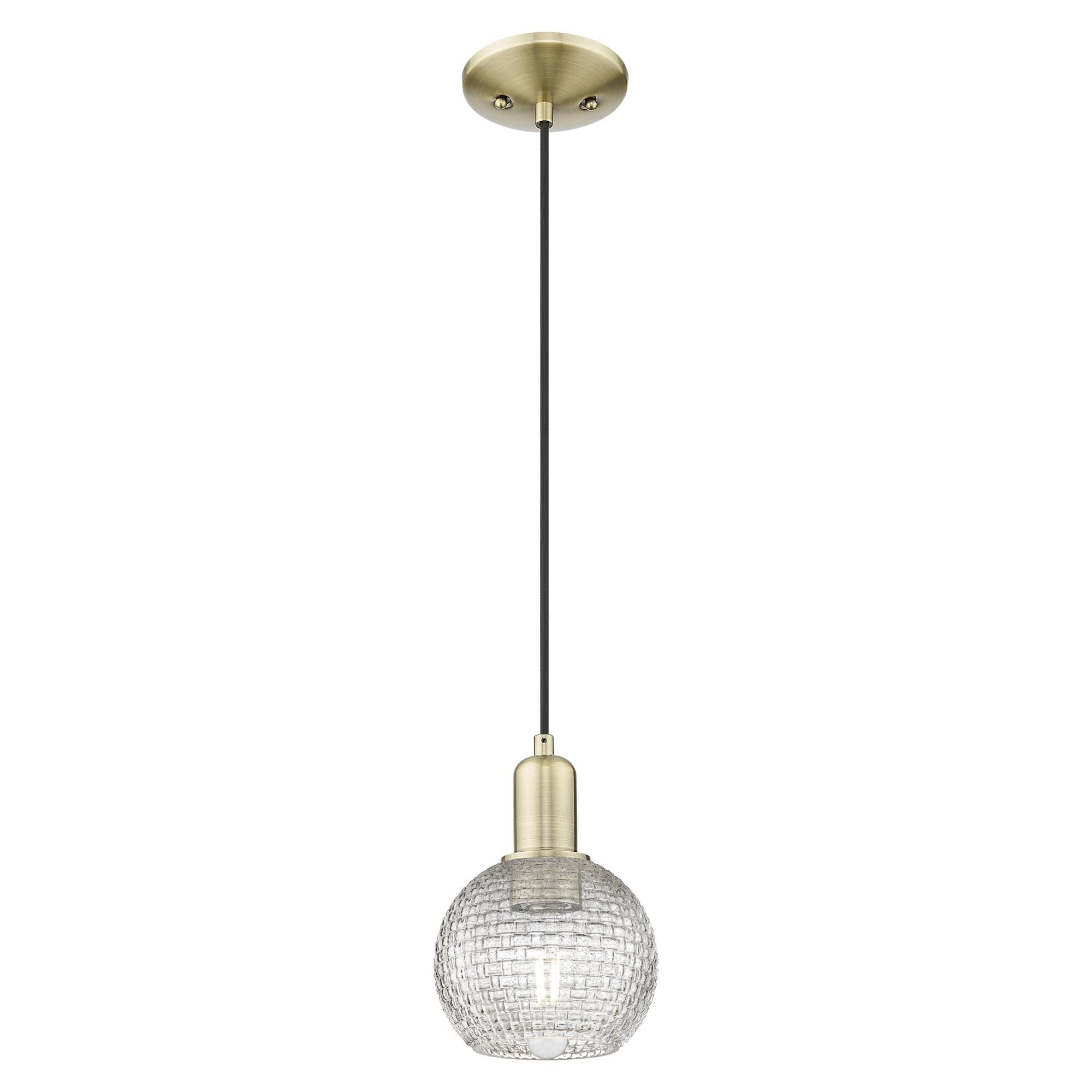 Shown in Antique Brass finish and Clear Basketweave glass