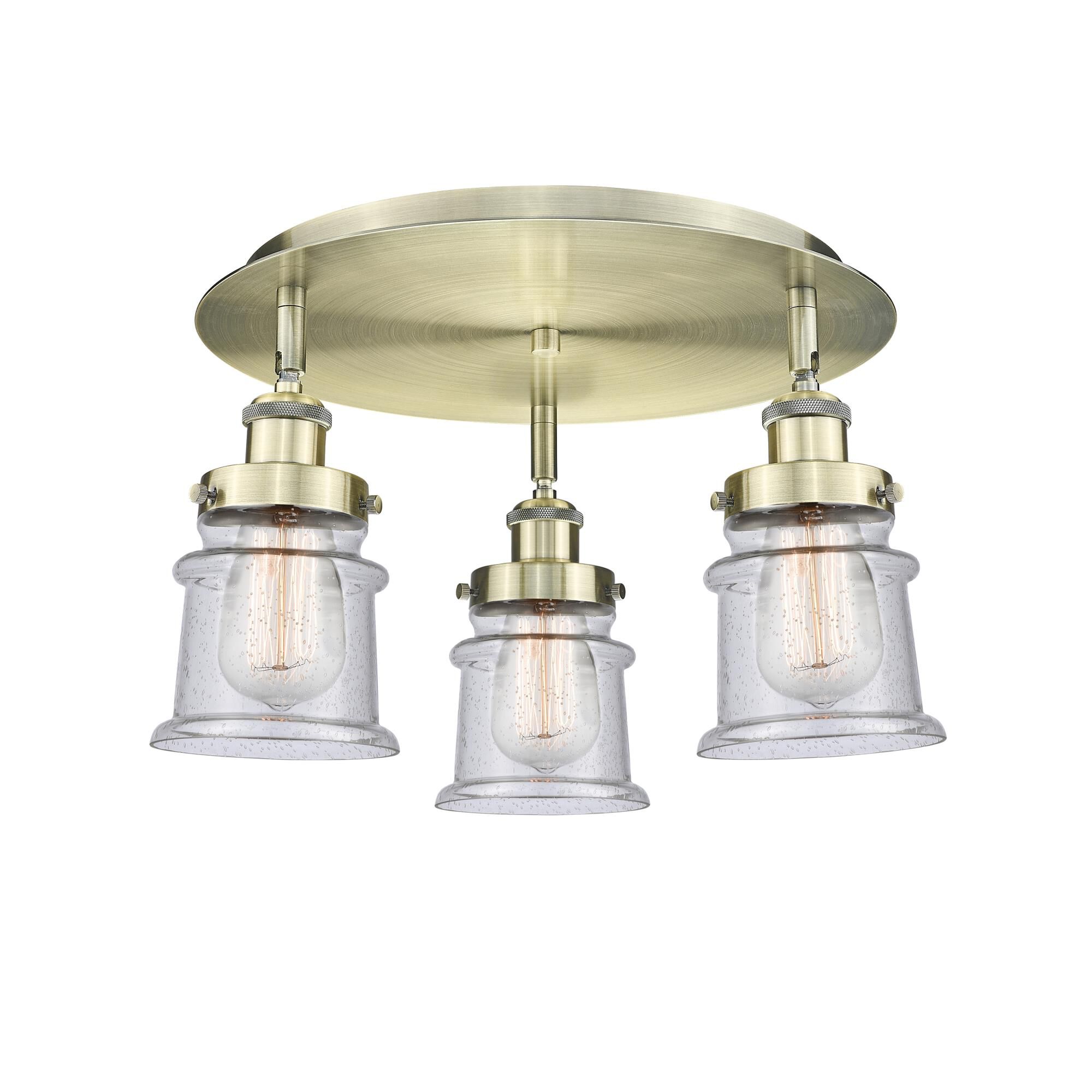 Shown in Antique Brass finish and Seedy glass