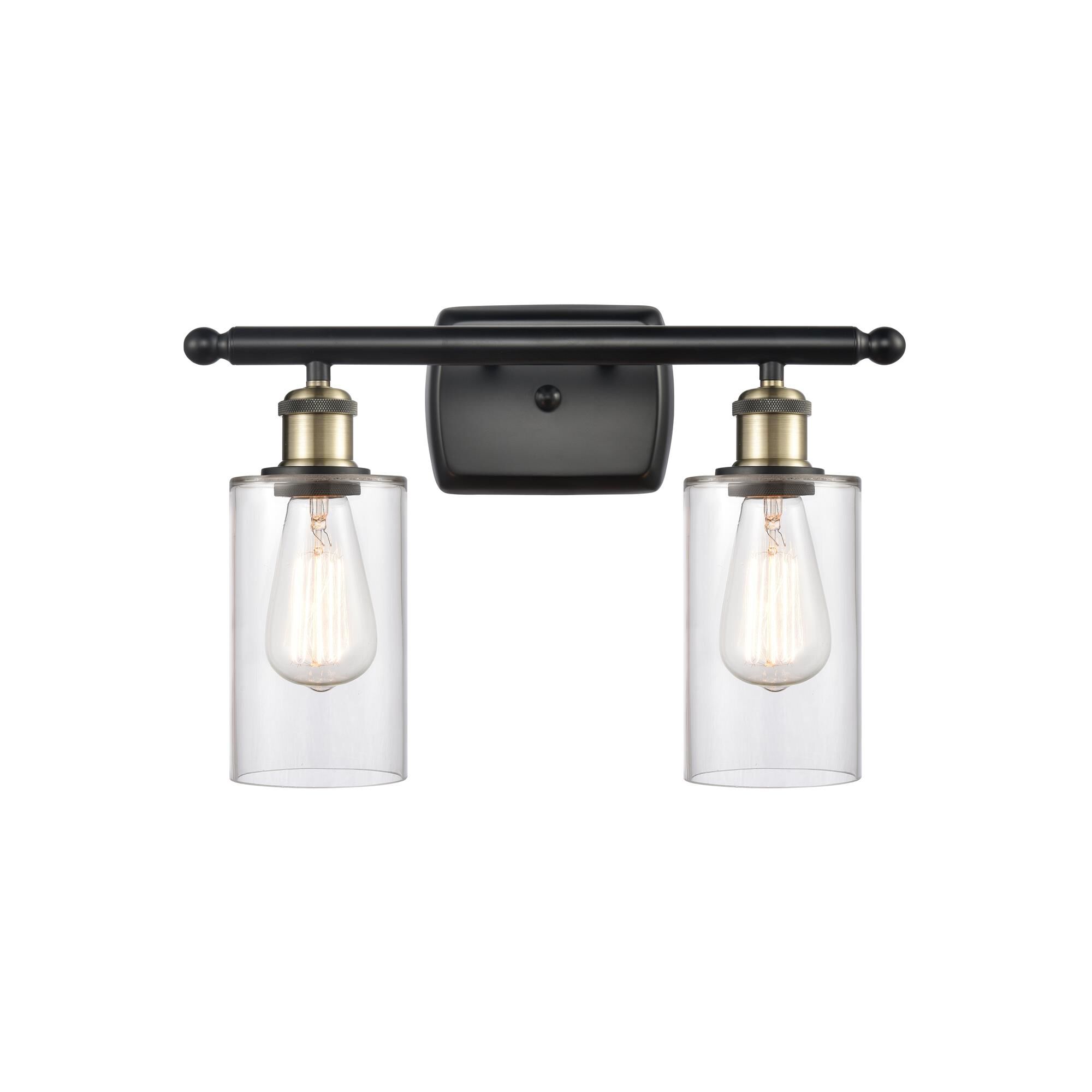 Shown in Black Antique Brass finish and Drum glass and Glass shade