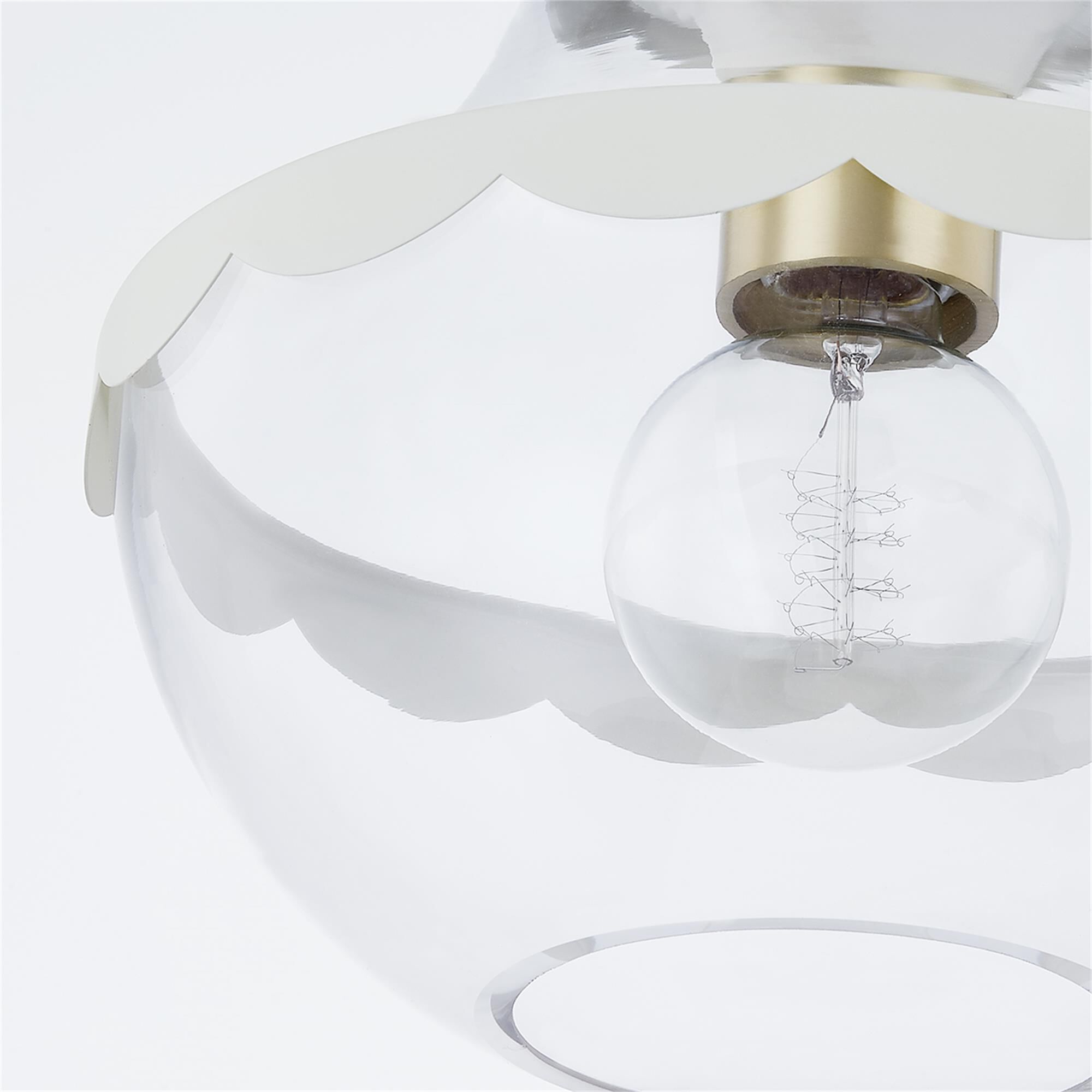 Shown in Aged Brass finish and Clear glass