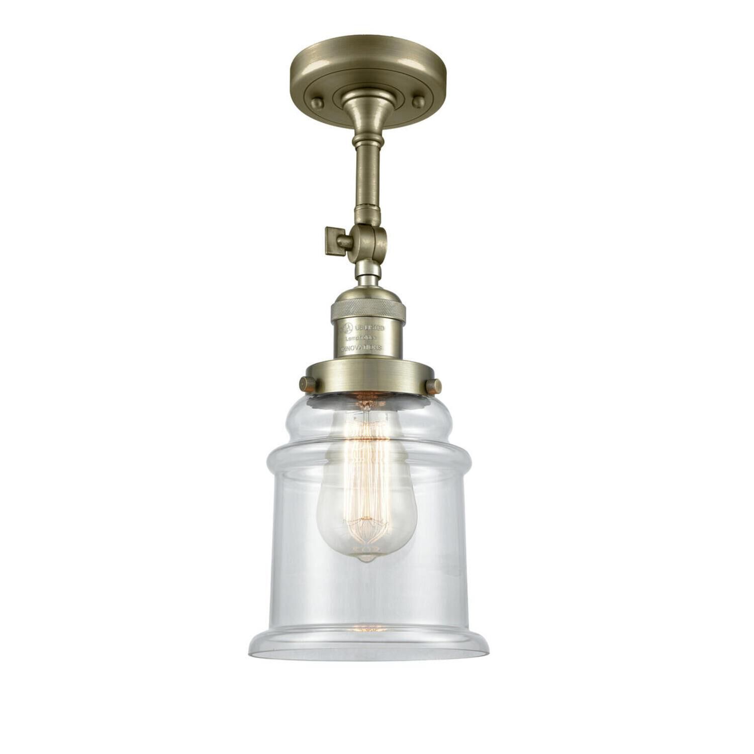 Shown in Antique Brass finish and Clear glass and None accent