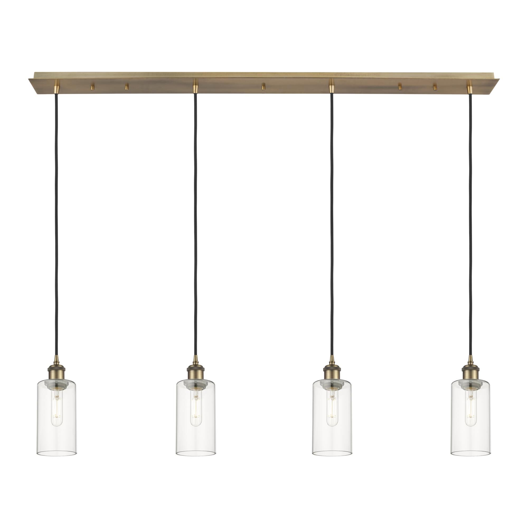 Shown in Brushed Brass finish and Clear shade