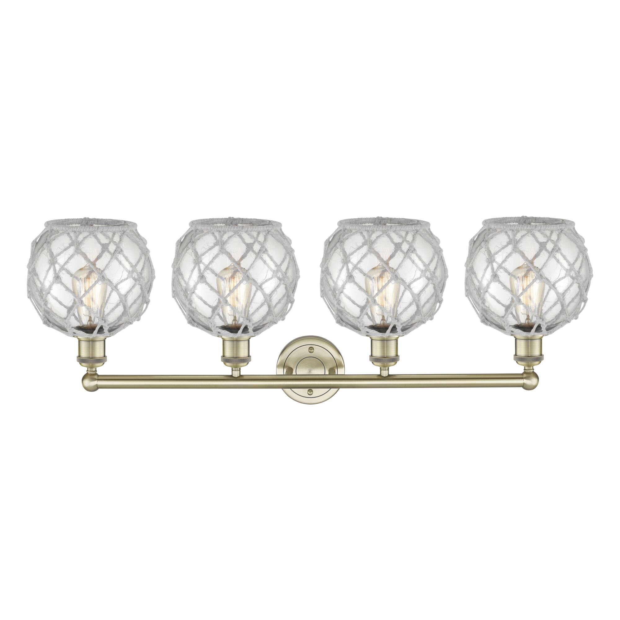 Shown in Antique Brass finish and Clear with White Rope glass