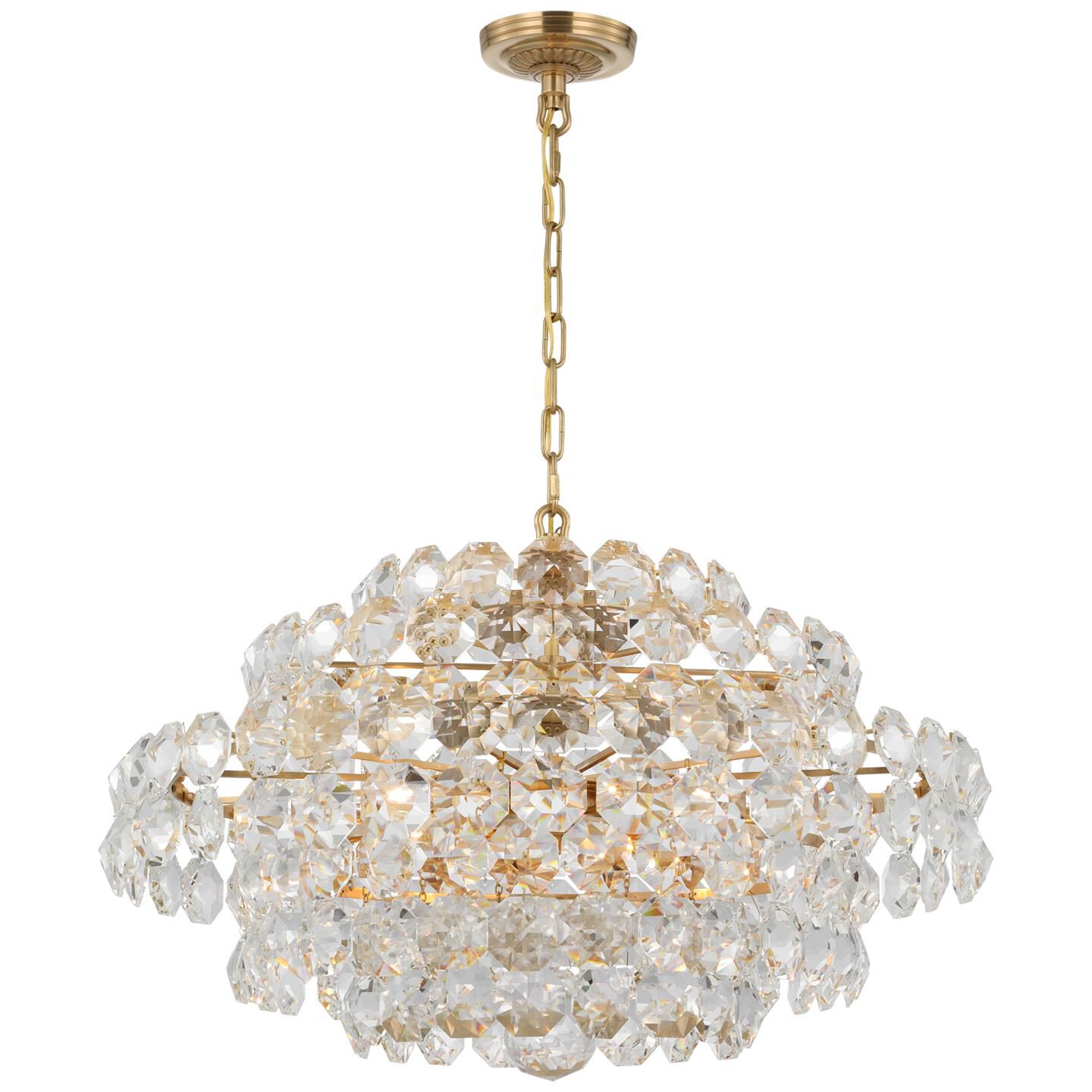 Shown in Hand-Rubbed Antique Brass finish and Crystal glass