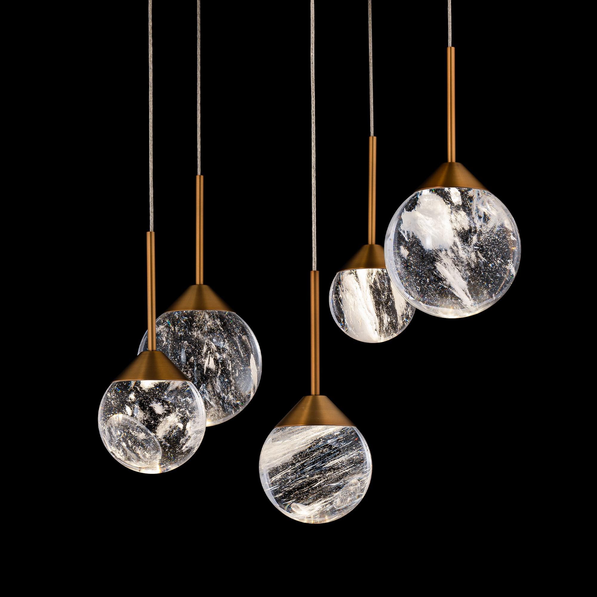 Shown in Aged Brass finish and Clear Optic Haze Crystal glass