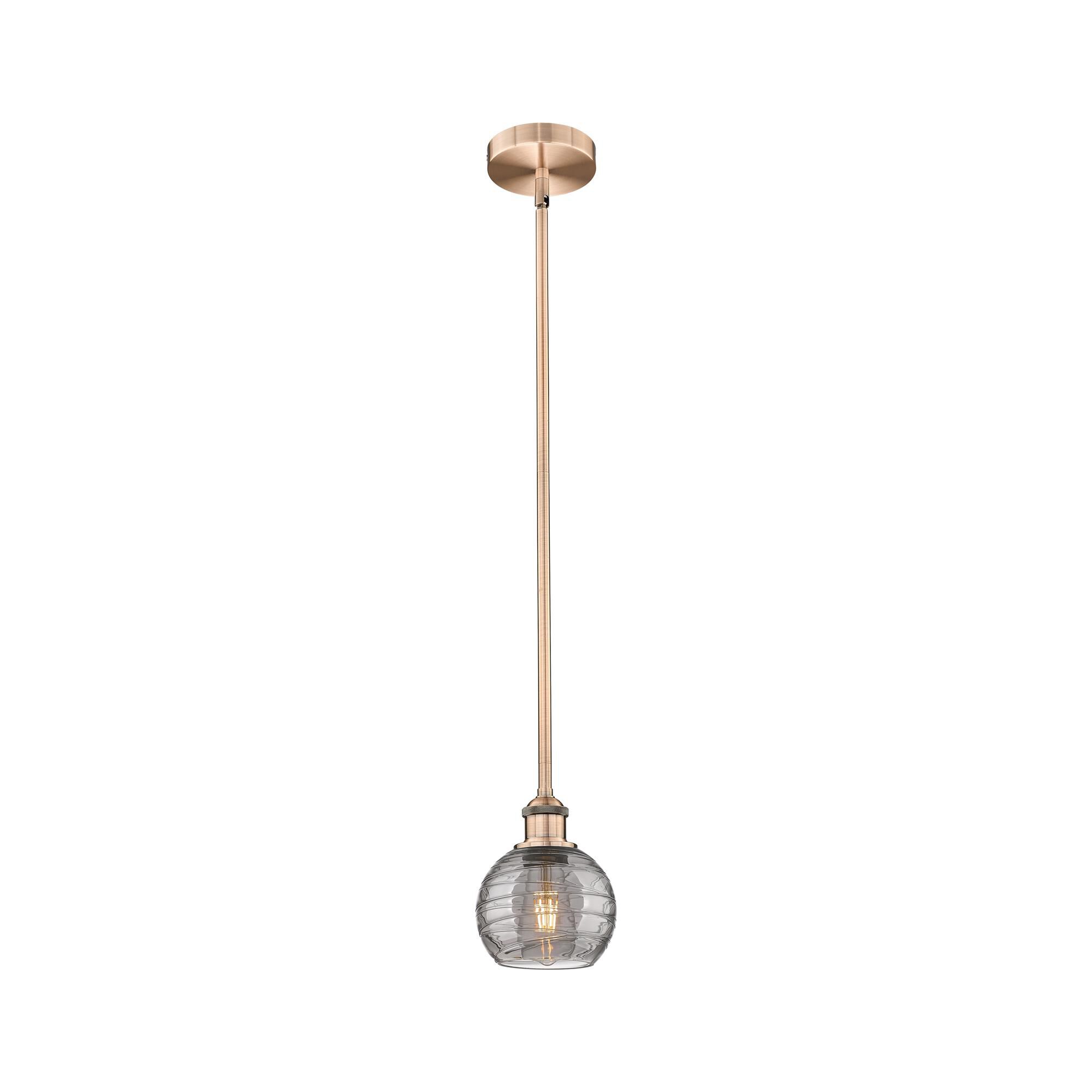 Shown in Antique Copper finish and Light Smoke Deco Swirl glass