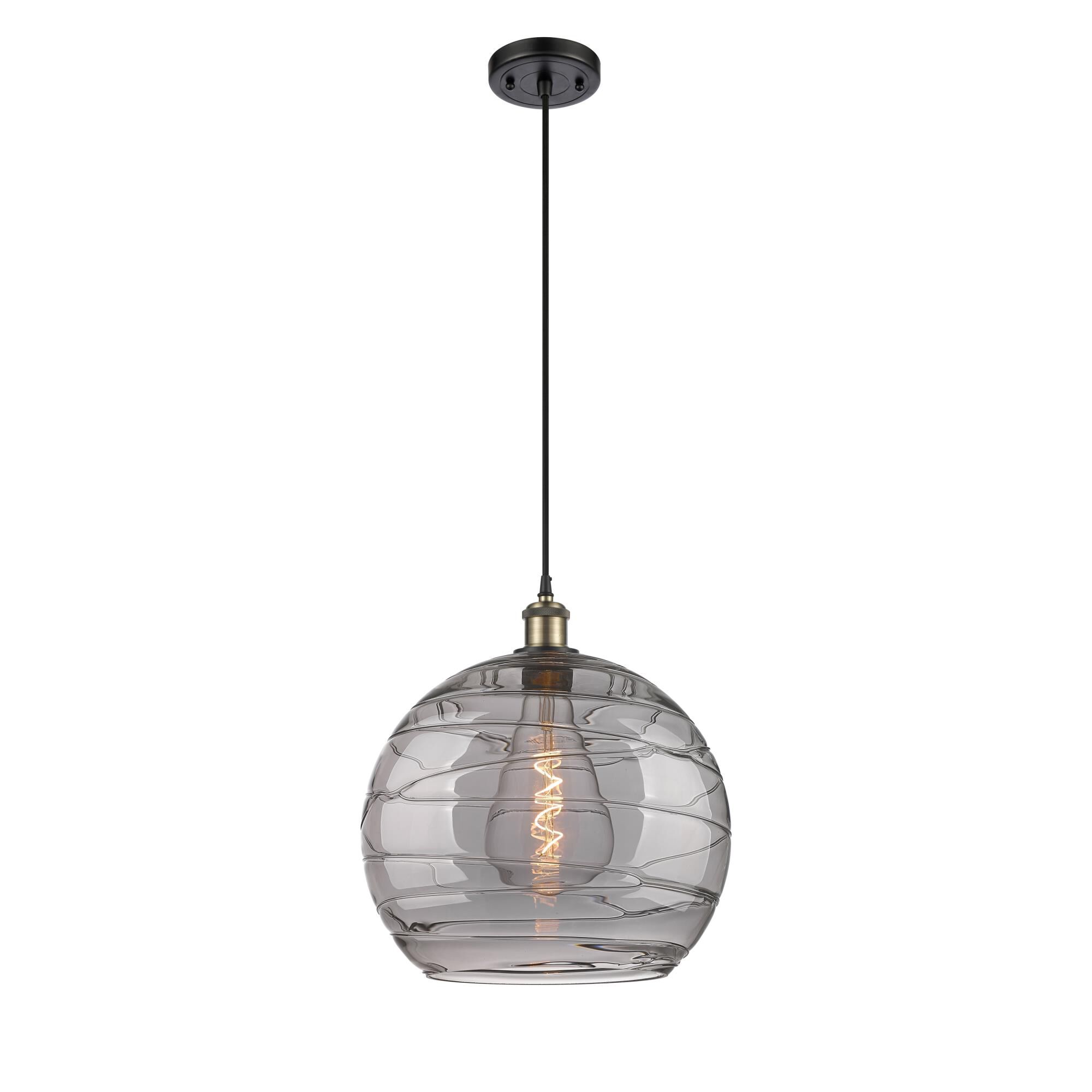 Shown in Black Antique Brass finish and Light Smoke Deco Swirl glass