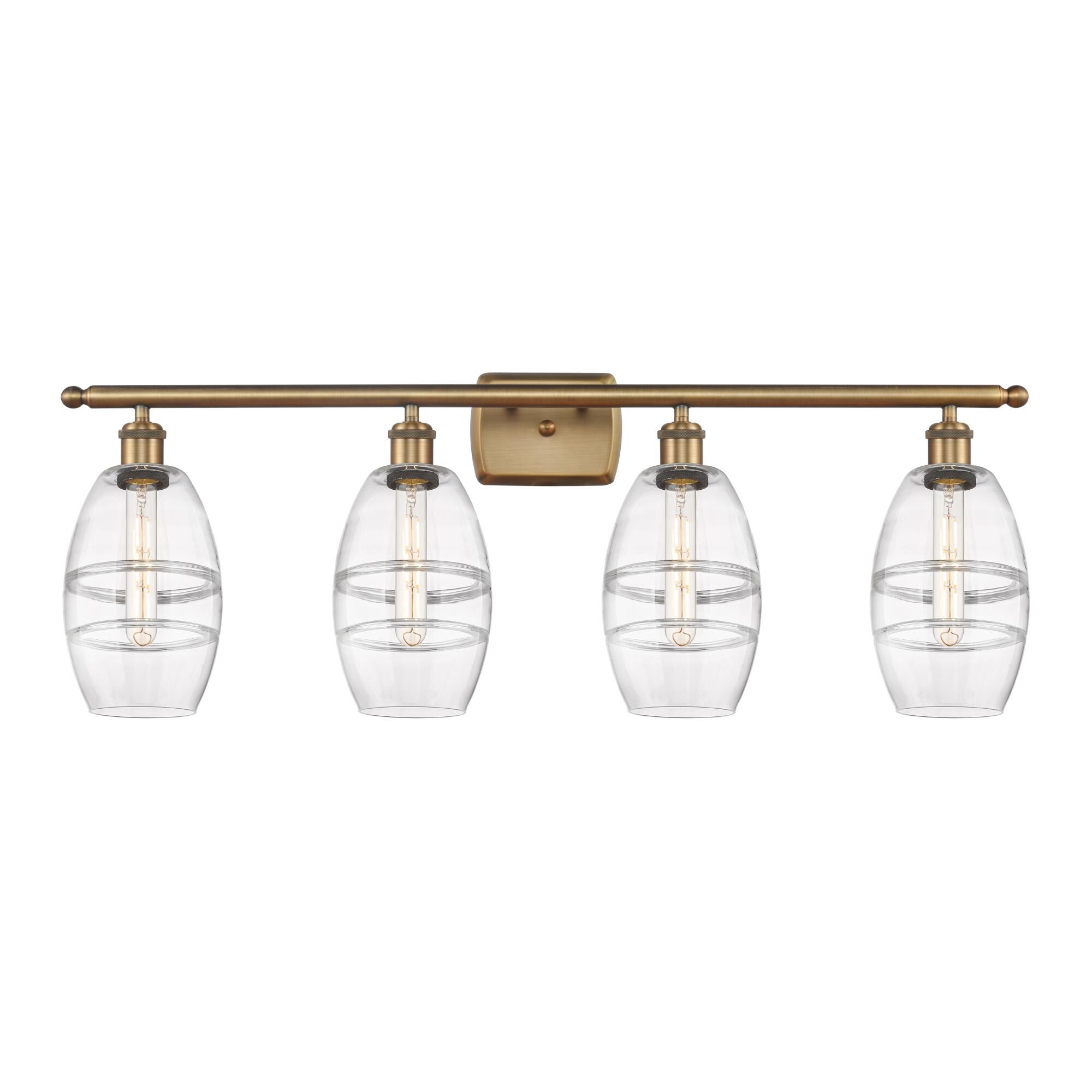 Shown in Brushed Brass finish and Clear glass