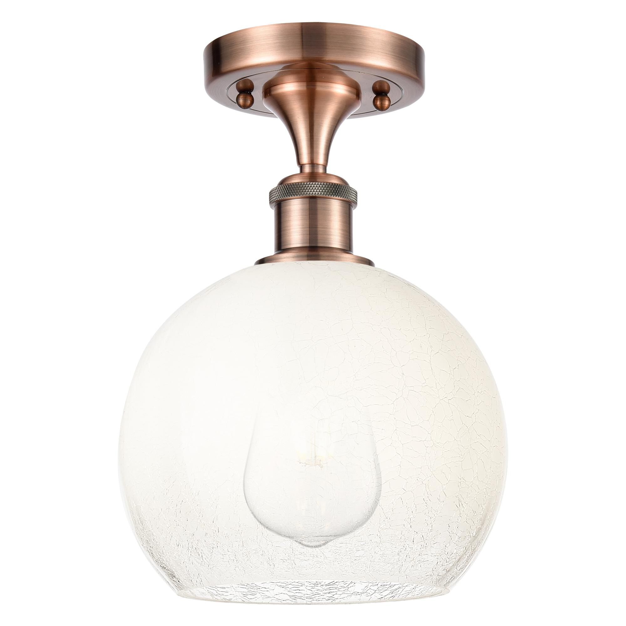 Shown in Antique Copper finish and Opal glass