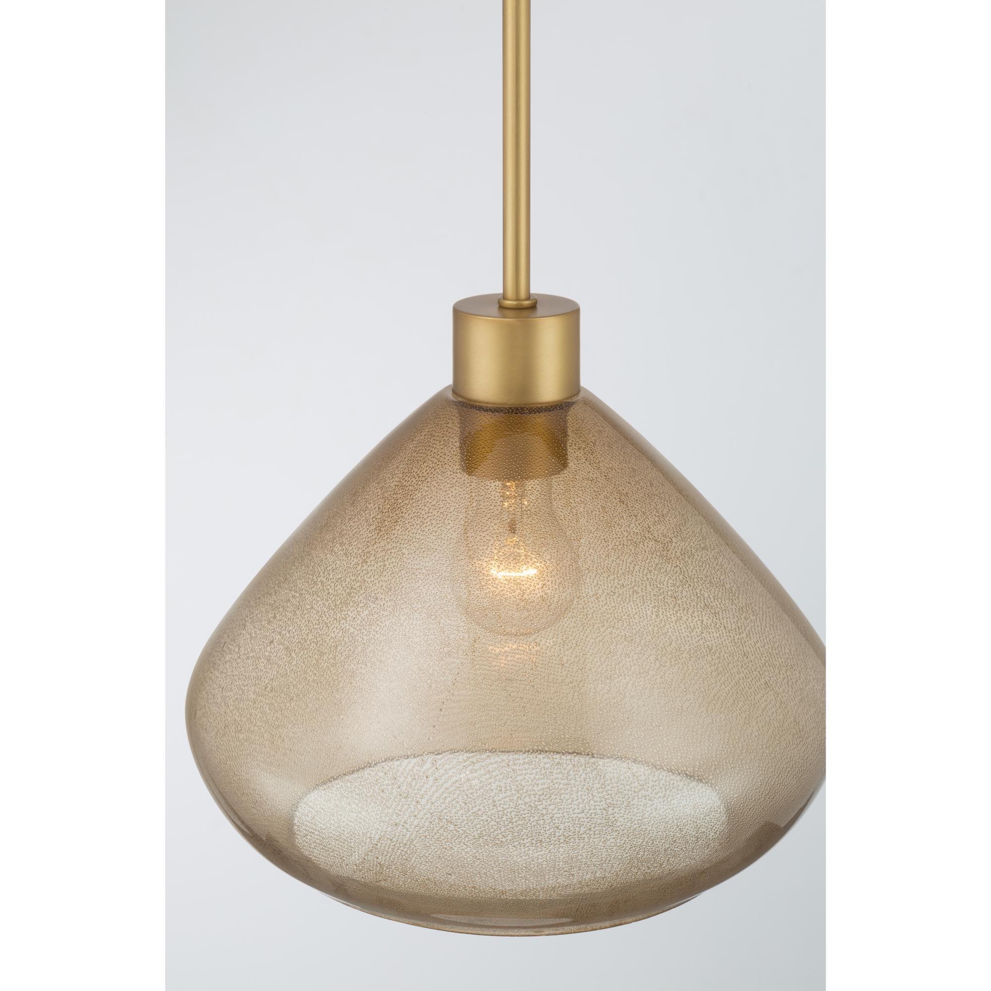 Shown in Legacy Brass finish and Brown Bubble glass