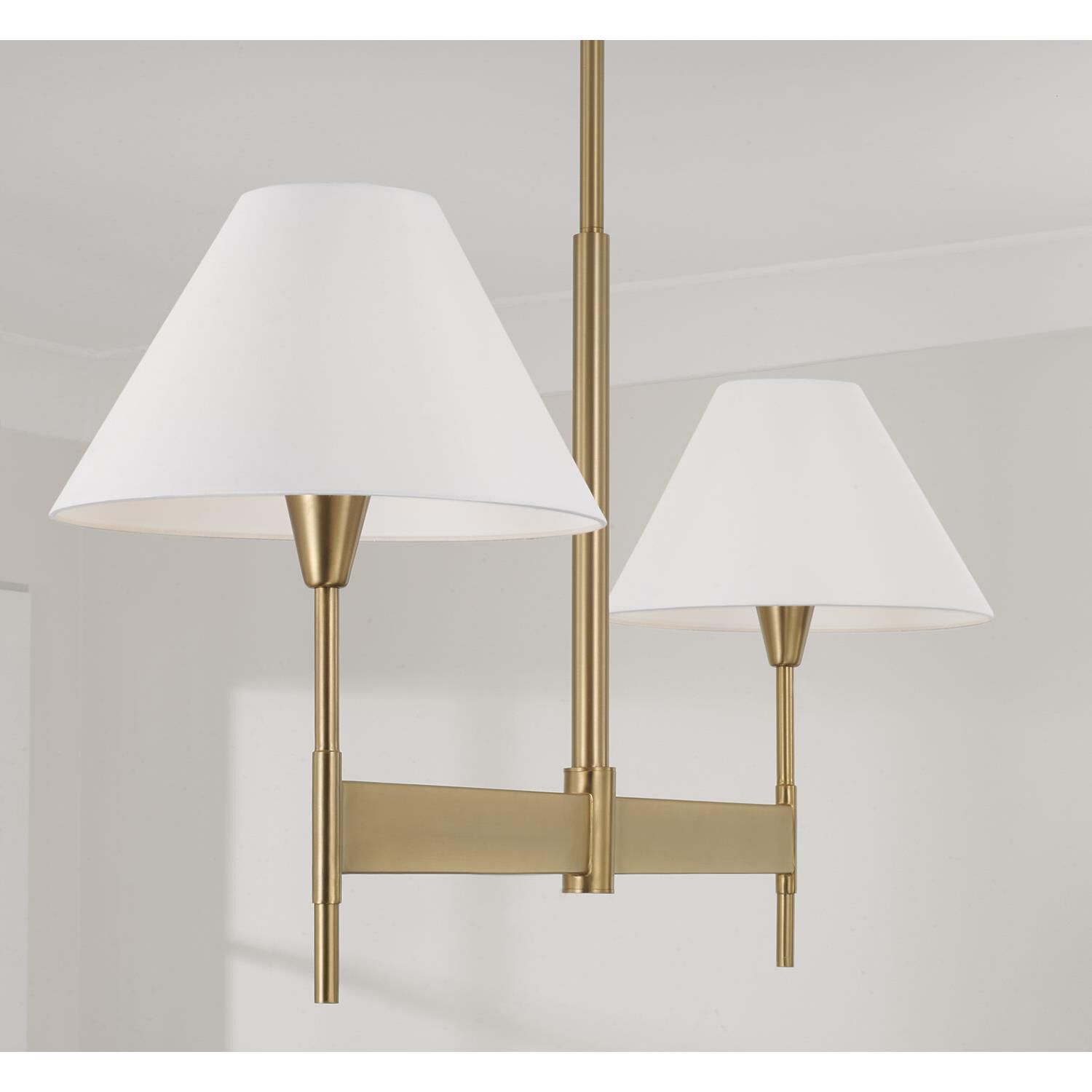 Shown in Aged Brass finish and White Fabric Stay-Straight s shade
